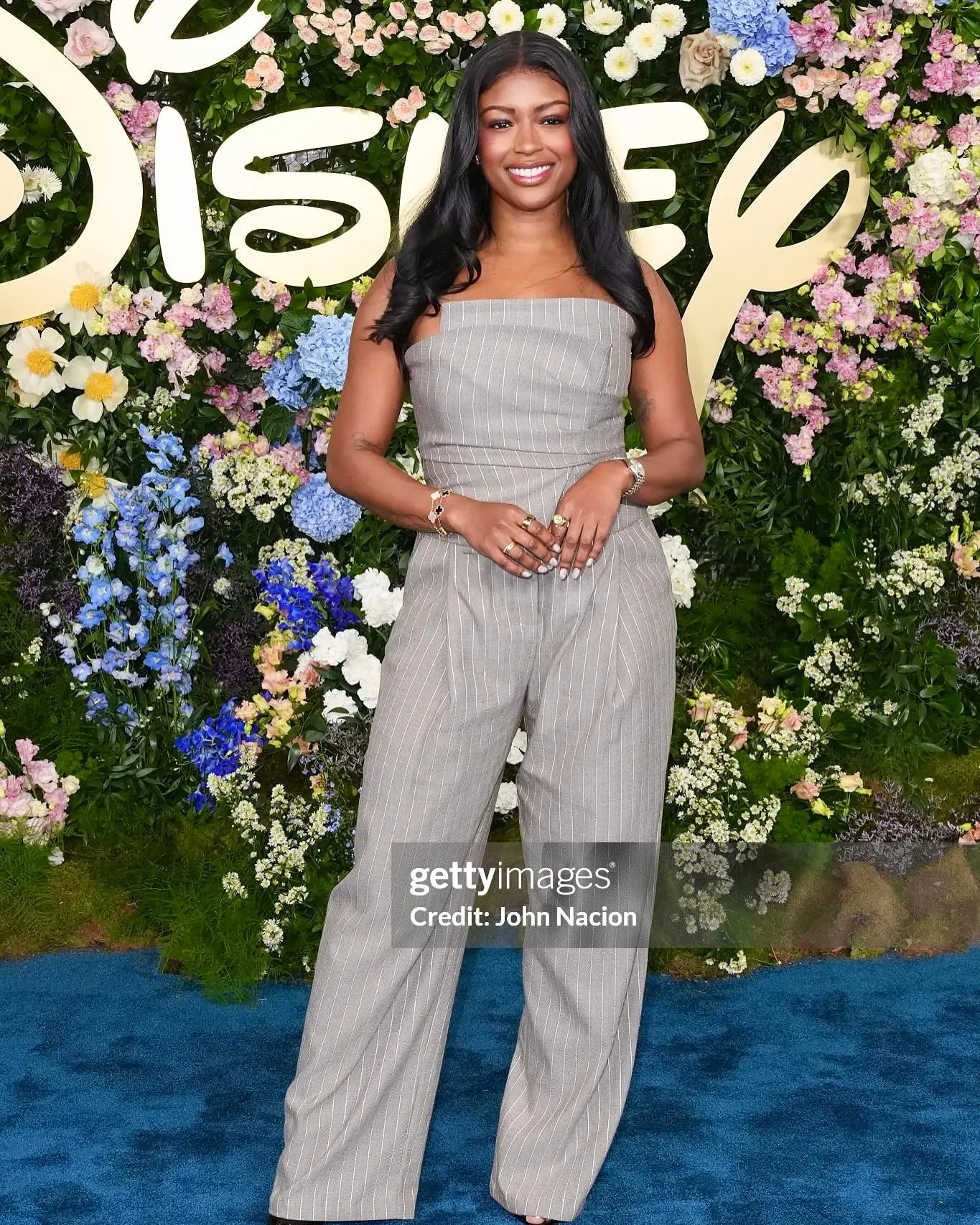 Celebrity Javicia Leslie dazzles at Disney Upfront 2025 with bold style and playful flair | On Stage!