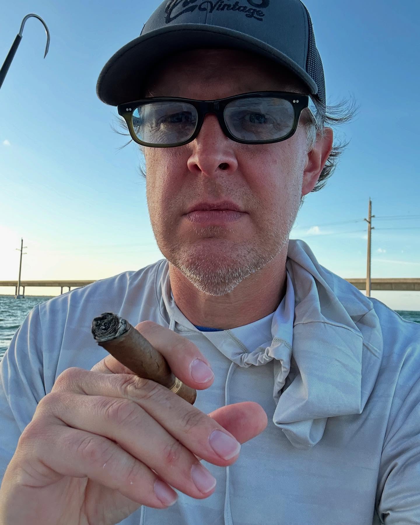 Joe Bonamassa Enjoys A Calm Day Fishing Blues icon takes a break for some fishing fun, showing a relaxed side beyond the spotlight