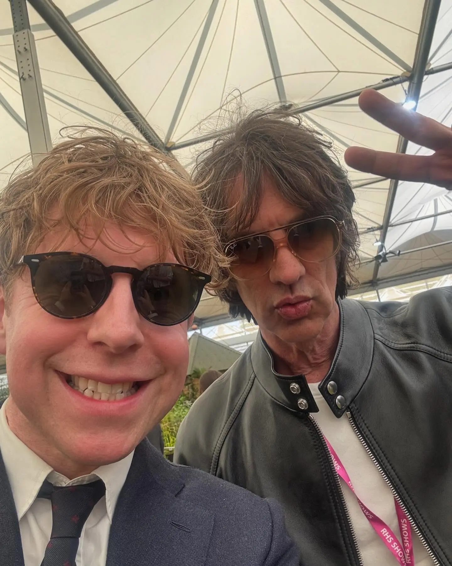 Josh Widdicombe Spotted At RHS Chelsea Widdicombe spotted at RHS Chelsea, flashing a peace sign in a rare celeb hideout today!!!