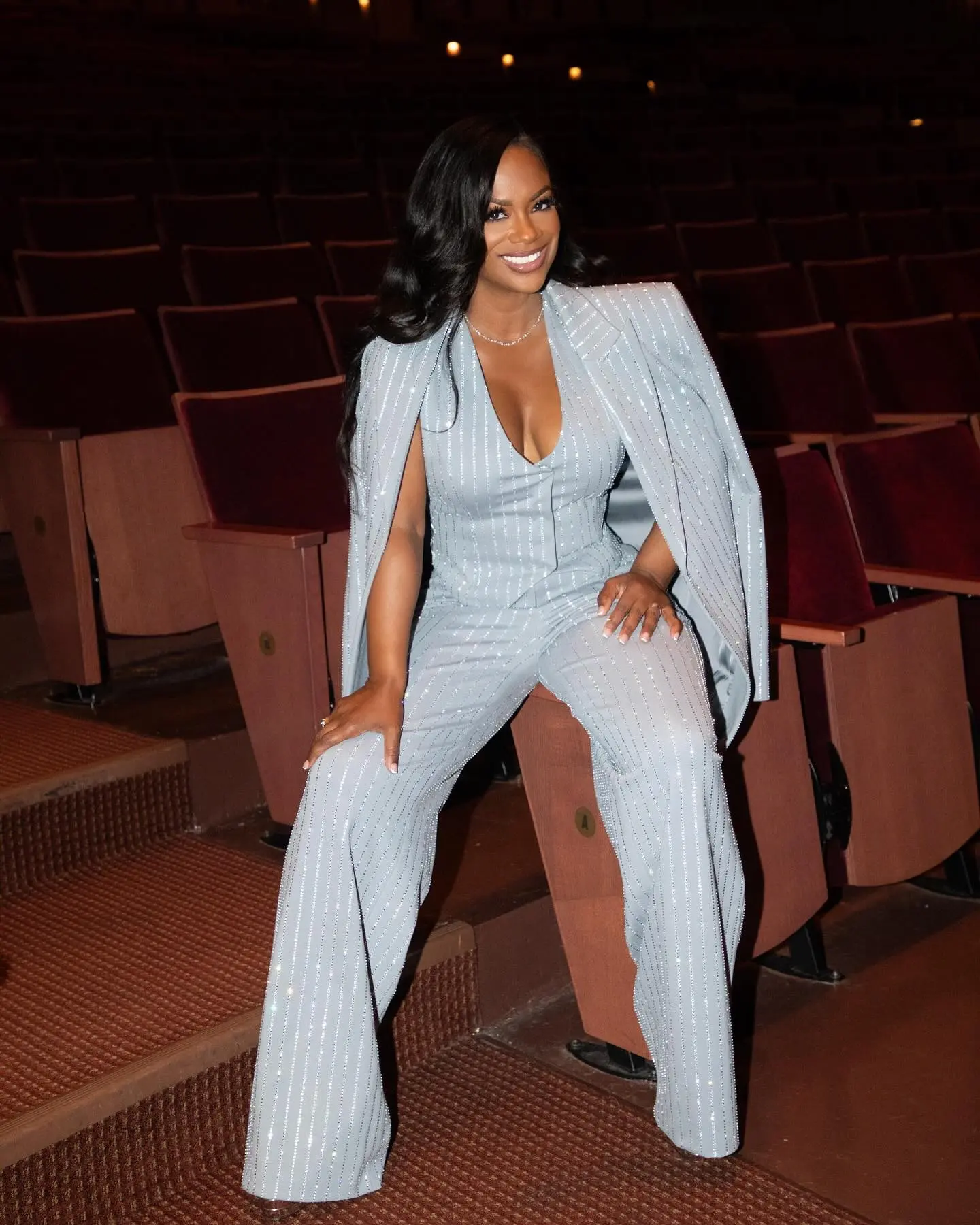 Style and gratitude blend as Kandi Burruss presents at Lortel Awards with heartfelt charm.