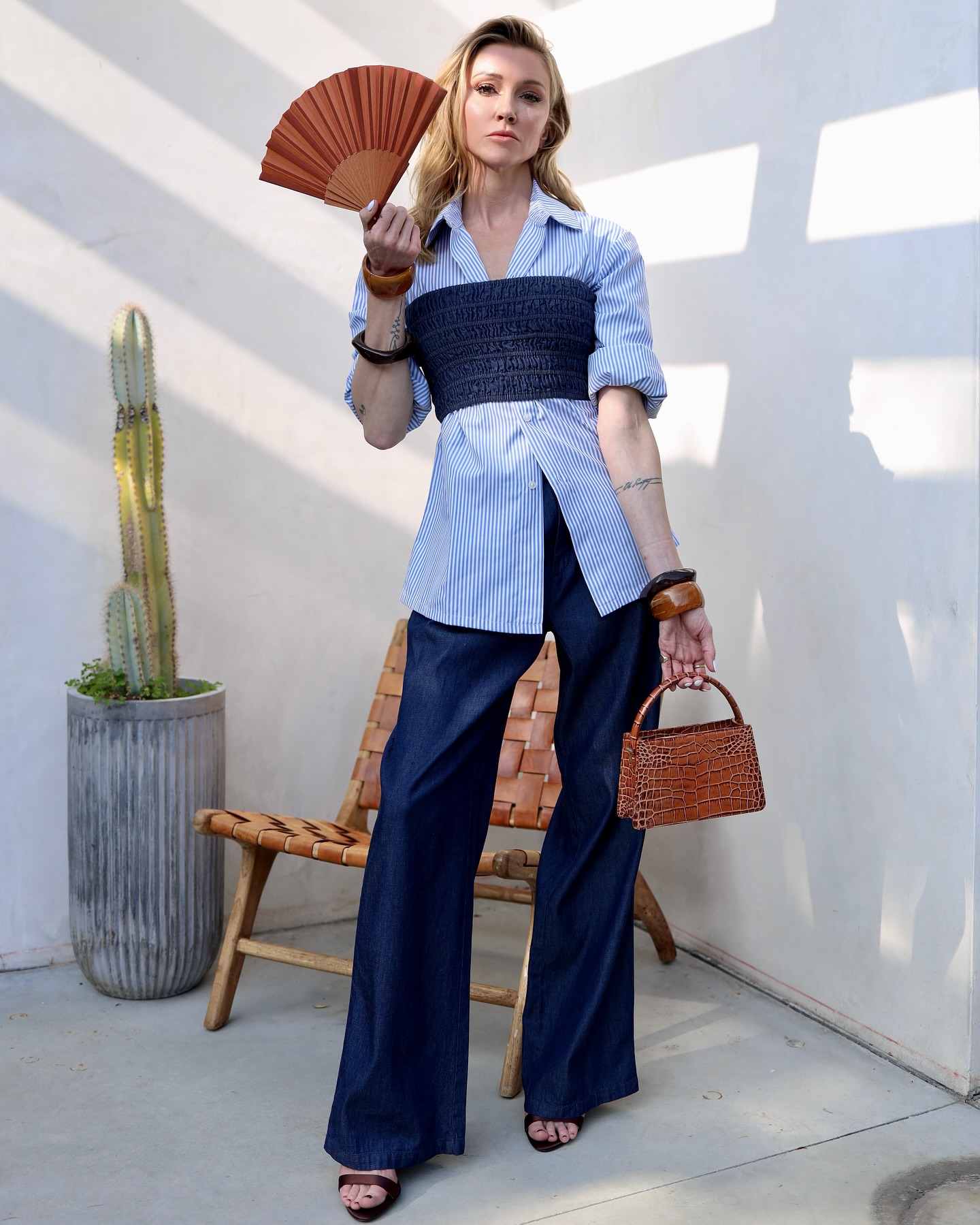 Katie Cassidy’s Blue Spring Fashion Moment Refreshing spring style with blue hues, chic bags, and curated labels exuding true glamor.
