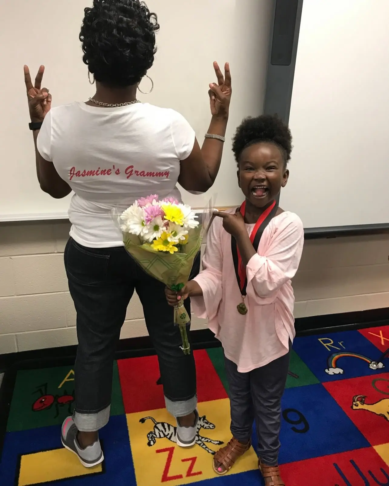 KD French Cheers as Daughter Jasmine Graduates 8th Grade