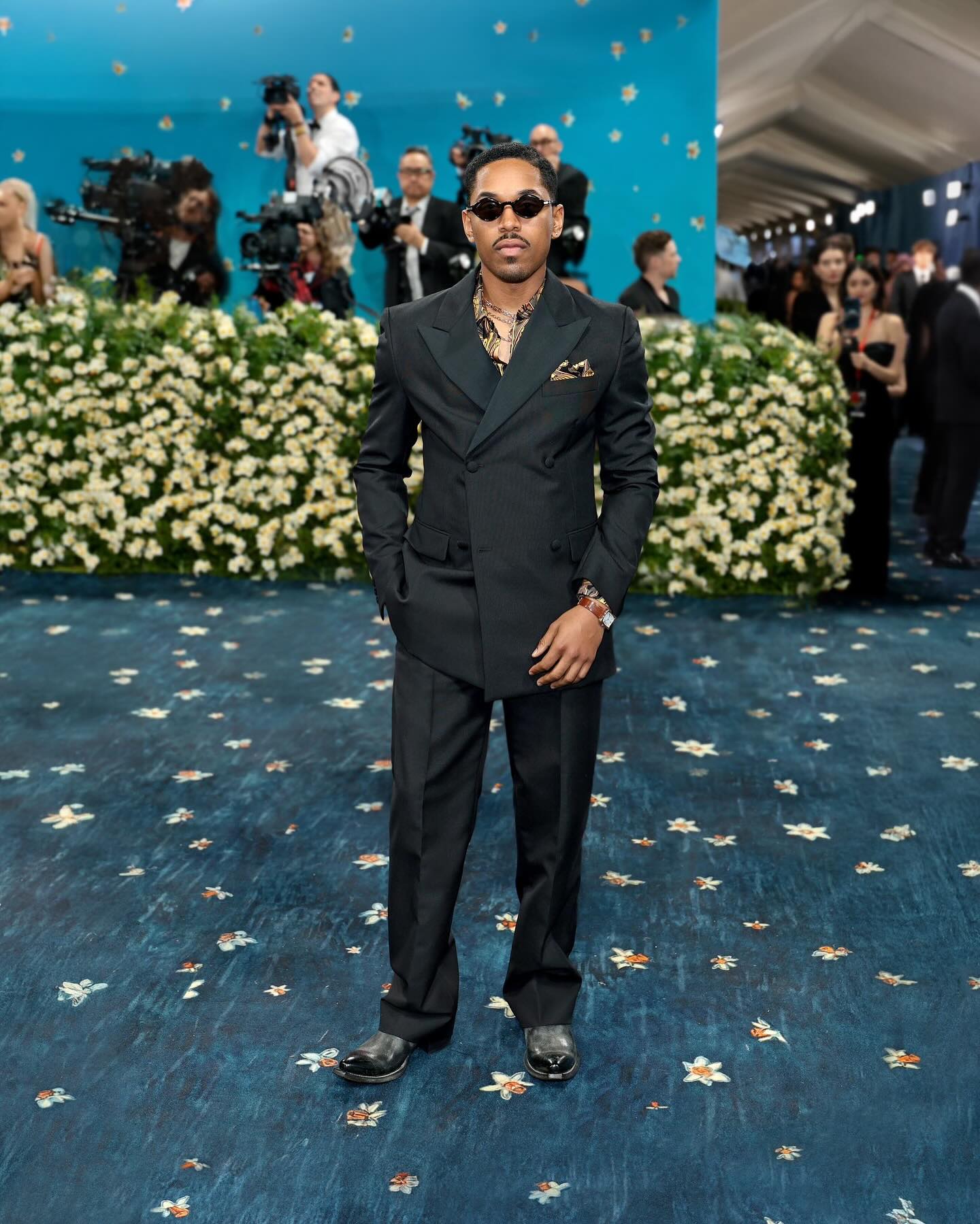 The actor delivers a refined Met Gala look honoring his pioneering cultural legacy in chic.