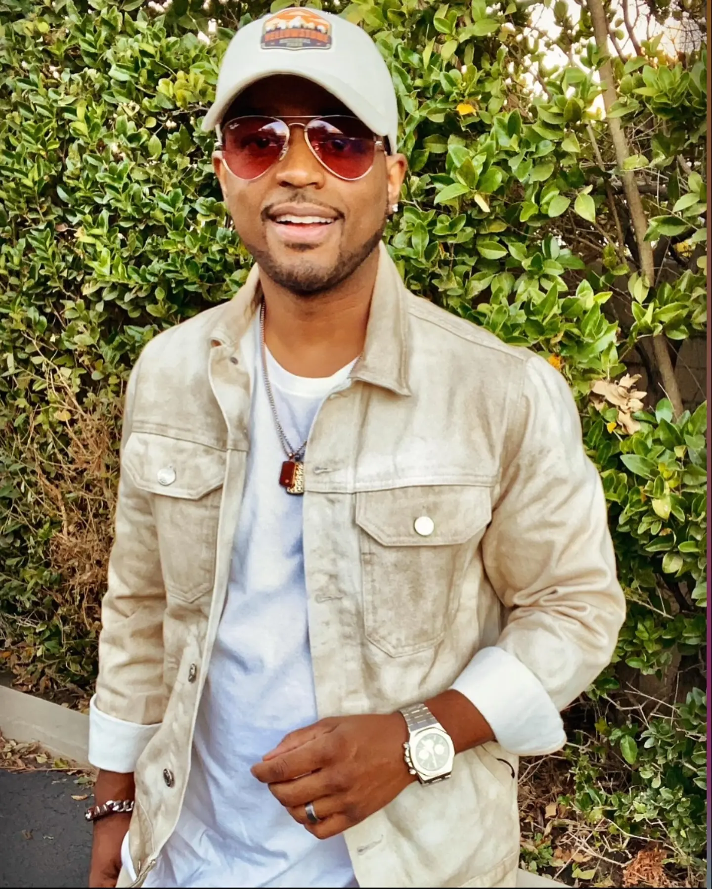 Larenz Tate urges fans to channel energy wisely and savor positive vibes always with flair.