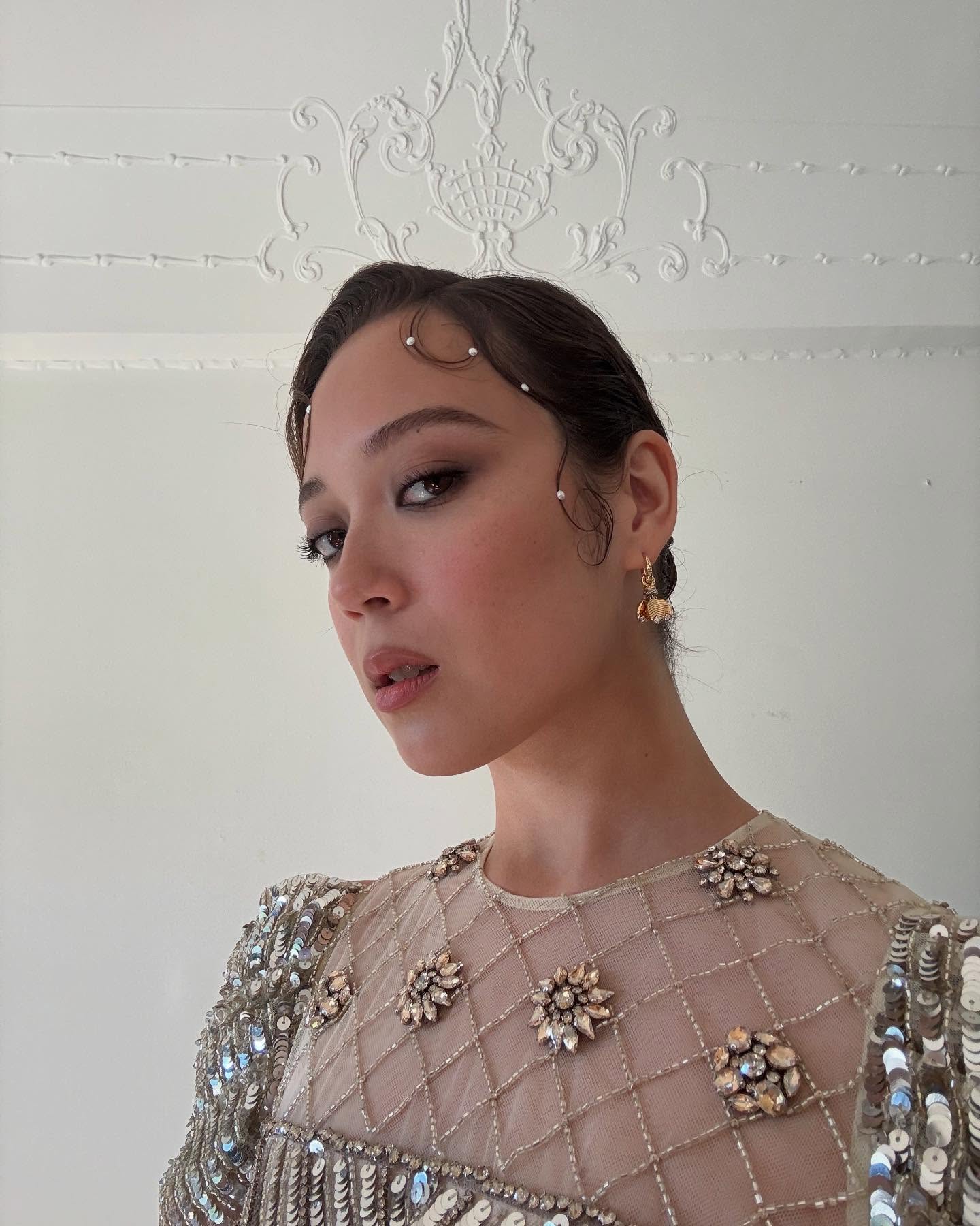 Laufey Embraces AAPI Love With Billboard Music Honor Gracefully dressed, singer Laufey honors her vibrant AAPI roots with a jazz-inspired look.
