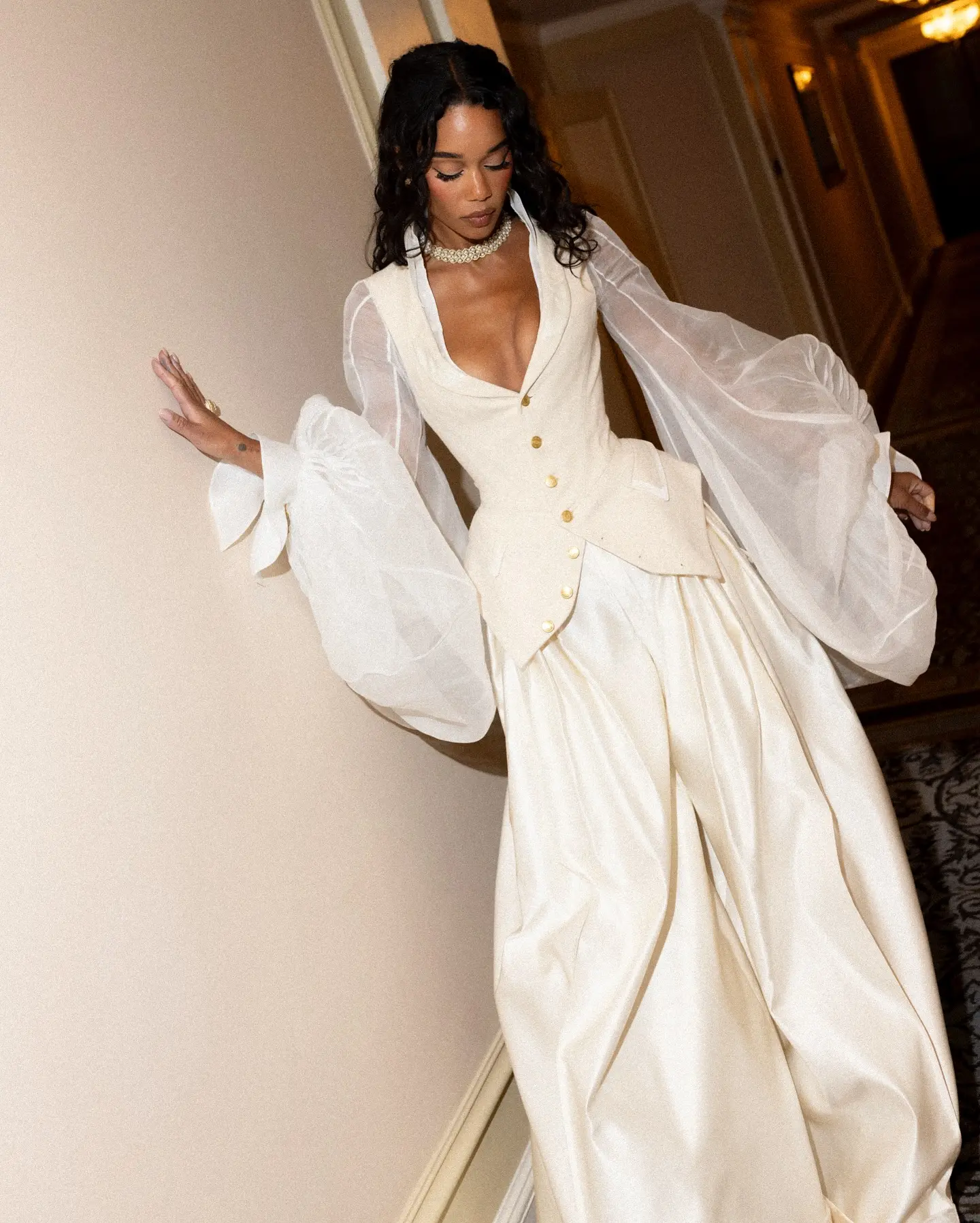 Laura Harrier Stuns at Met Gala in Bold Gap Look