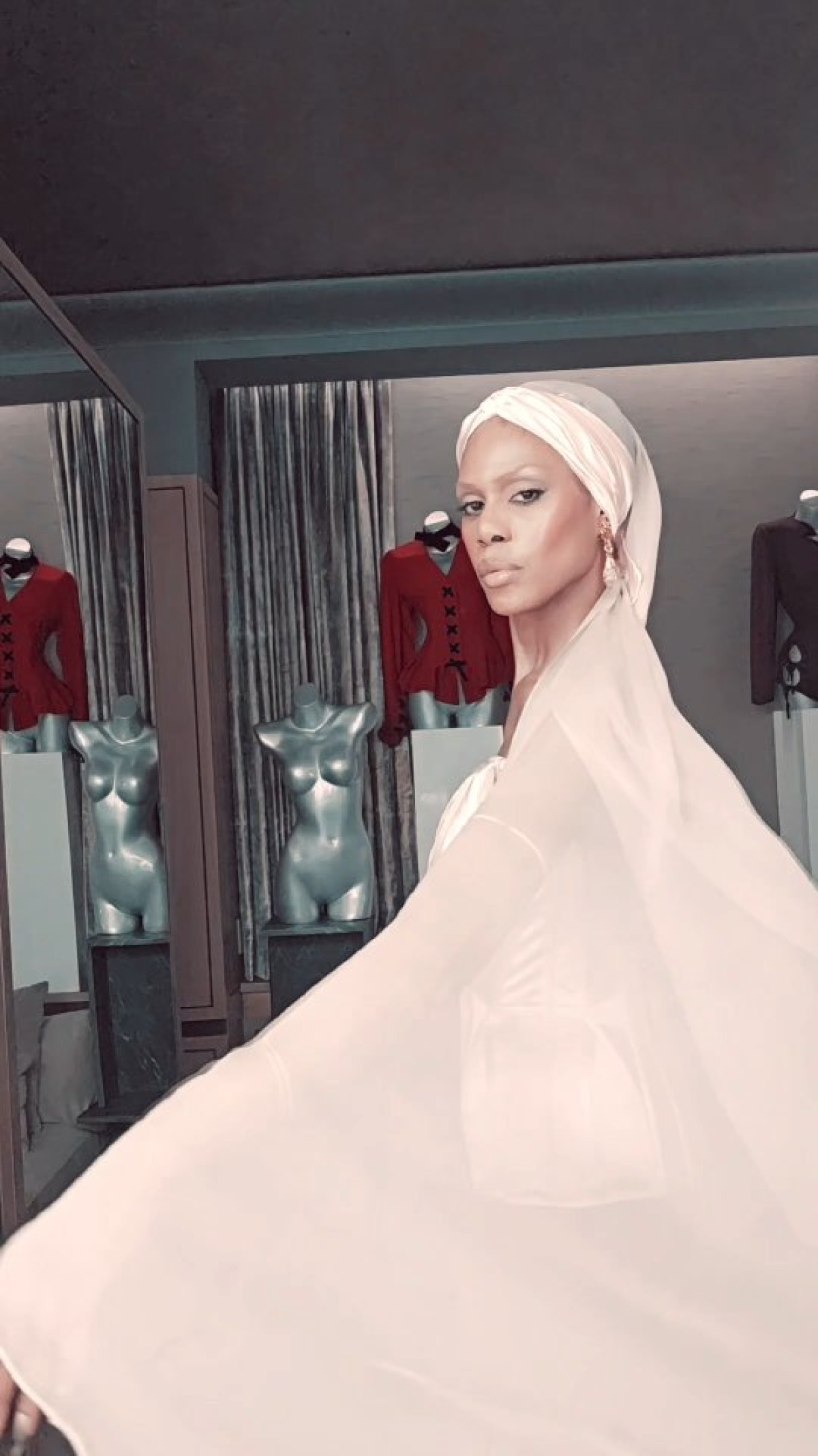 Laverne Cox redefines Mugler style with bespoke tailoring and a fresh white corset twist.