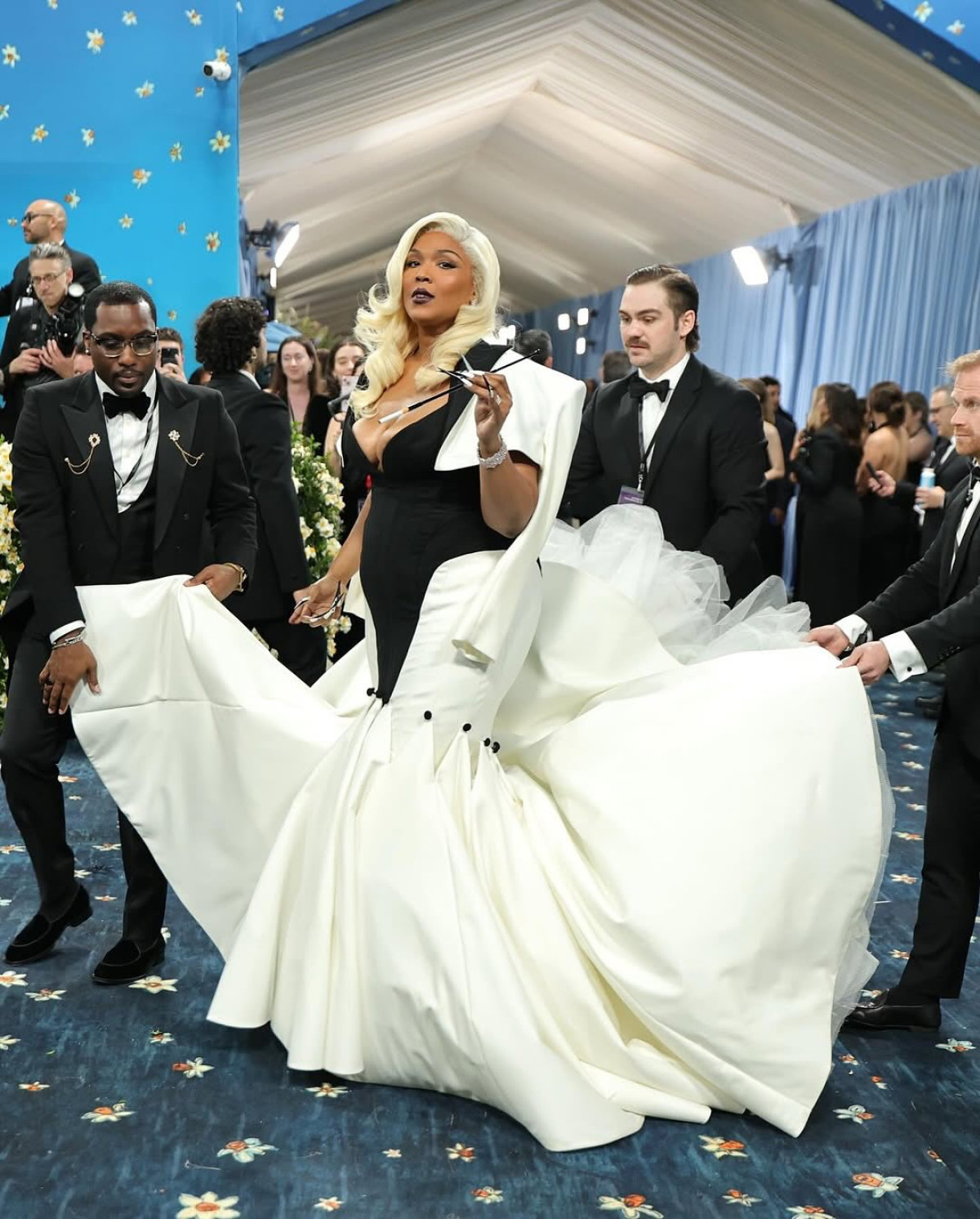 Lizzo Stuns With Heritage-Inspired White Tuxedo Look Ancestral vibes meet modern chic in a dazzling style display at an unforgettable Met gala!