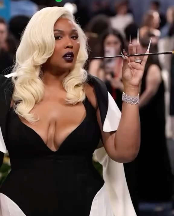 Lizzo Stuns With Heritage-Inspired White Tuxedo Look