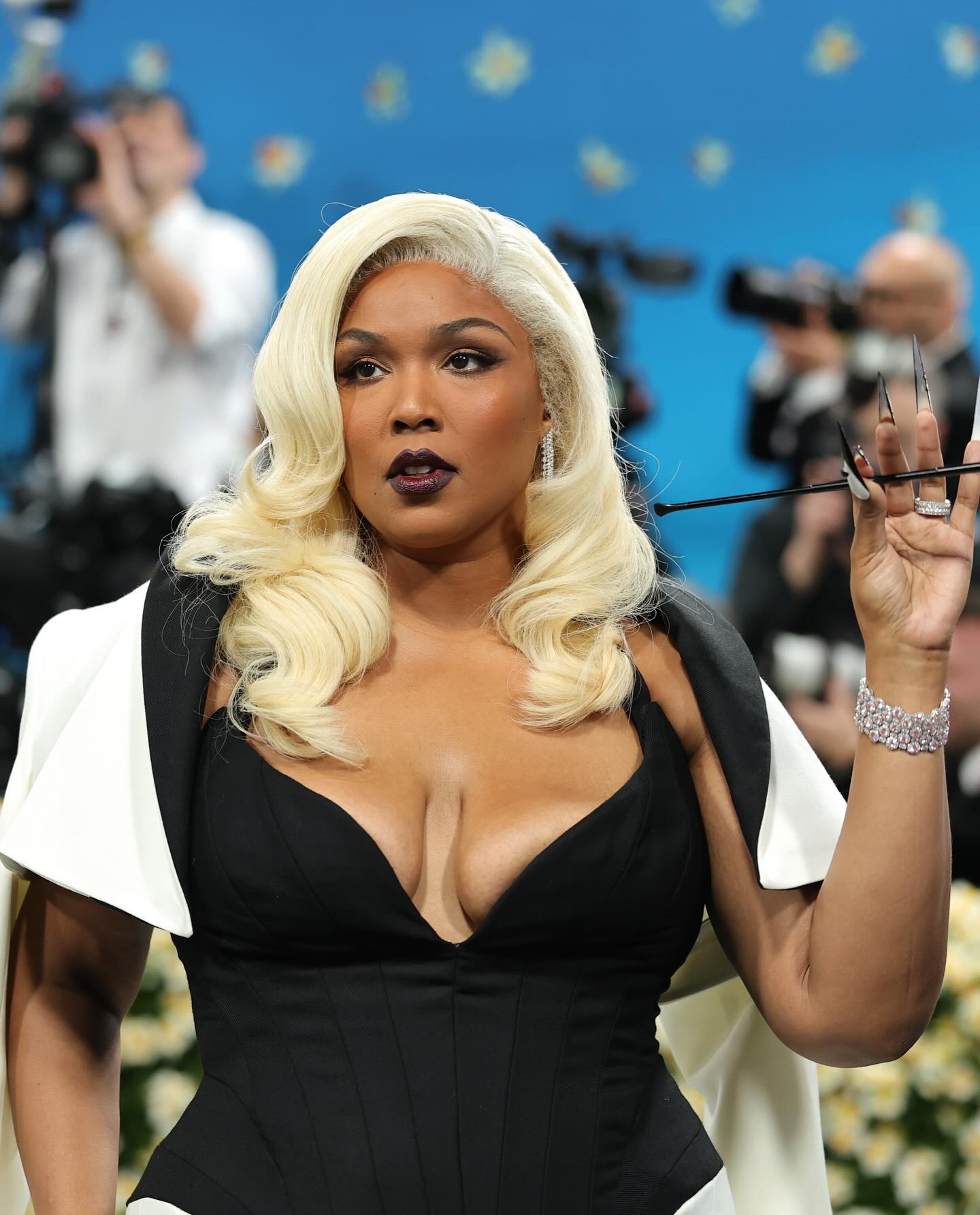 Lizzo Stuns With Heritage-Inspired White Tuxedo Look