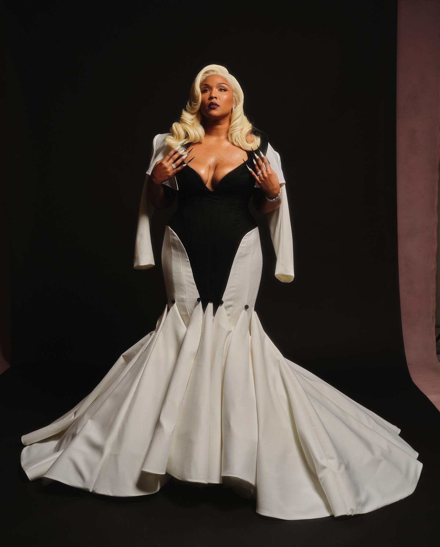 Lizzo Stuns With Heritage-Inspired White Tuxedo Look