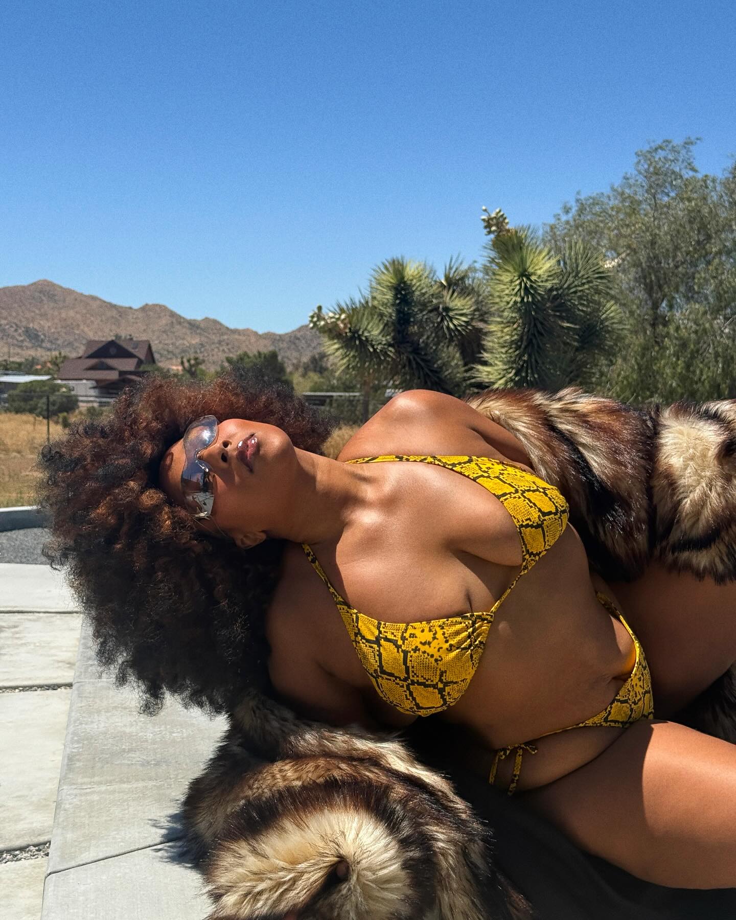 Lizzo’s Python Swim Drop: Bold Summer Fashion Unveiled