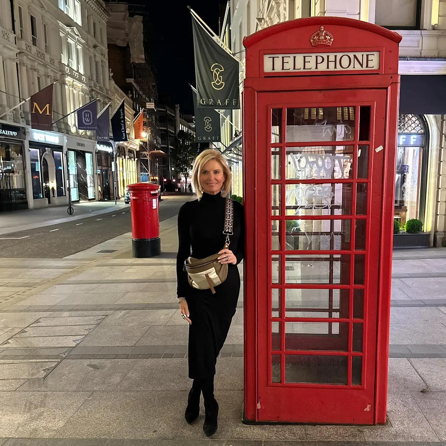 London Calling: Roma Downey Hits Mayfair In Style Roma Downey turns heads in Mayfair as iconic telephone boxes meet chic modern London vibes.