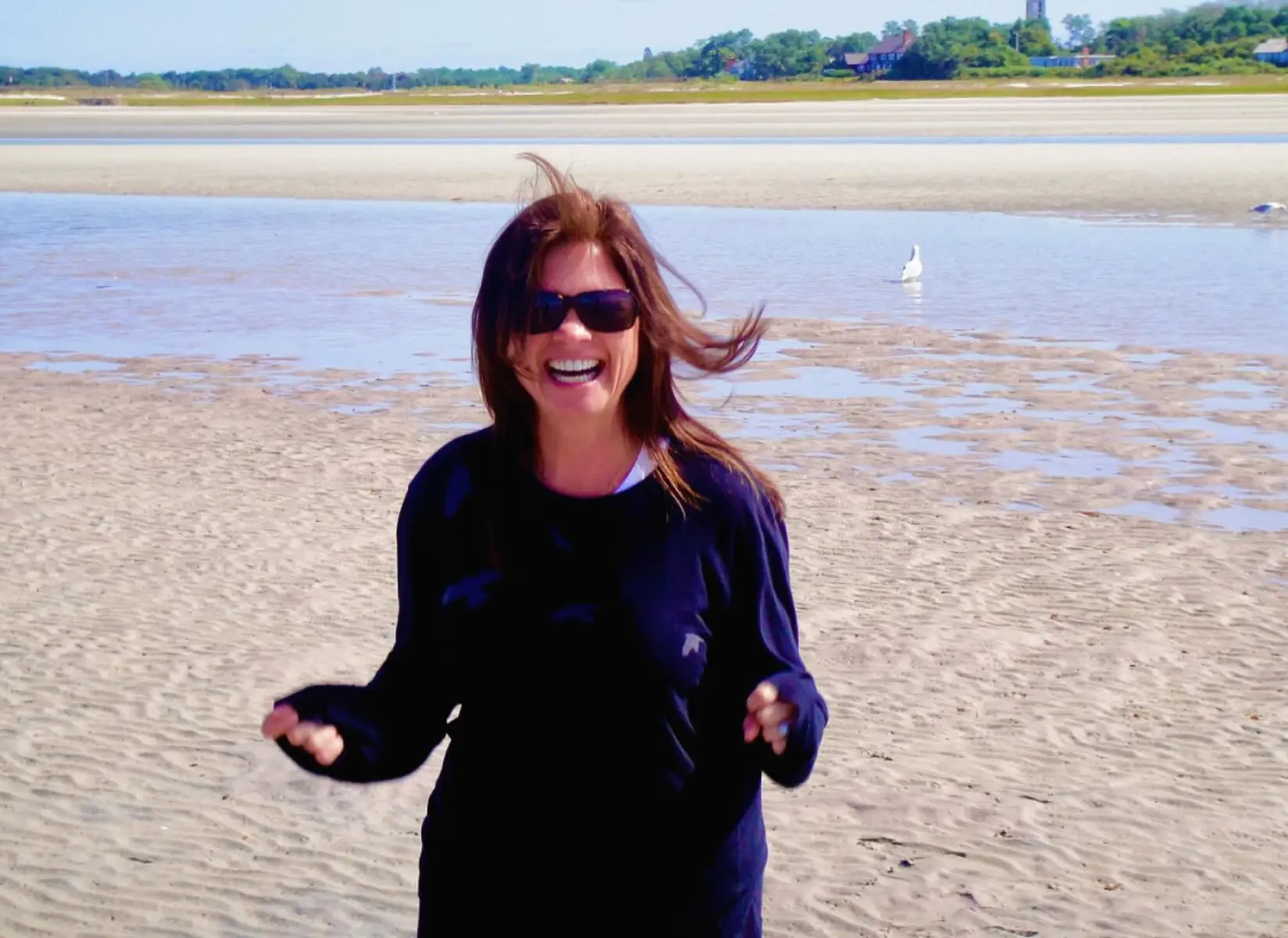 Glimmers of joy shine at Provincetown low tide, inspiring gratitude and serene reflections!