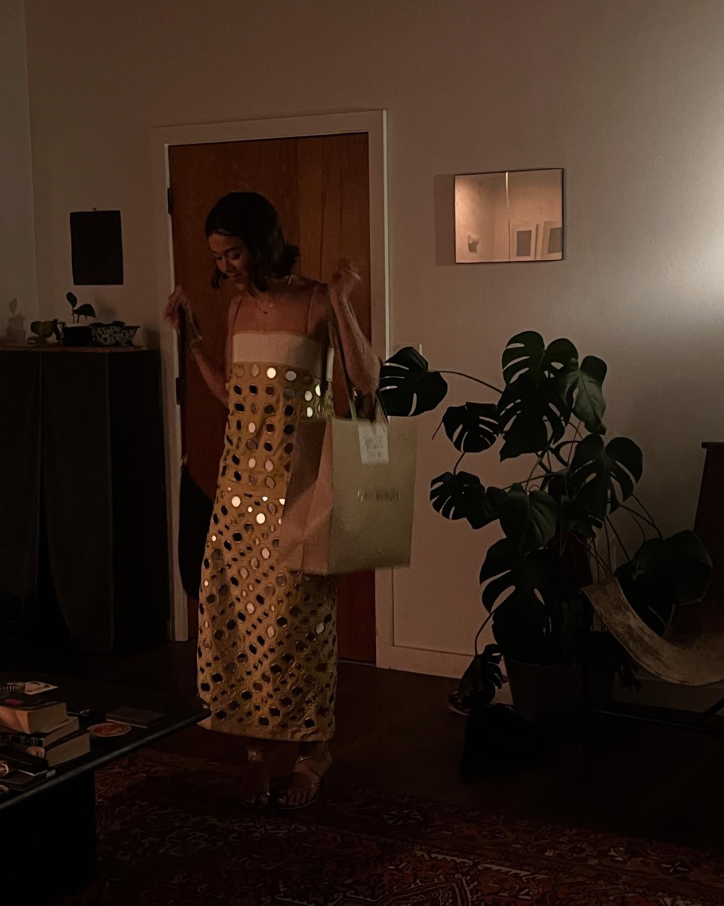 Lukita Maxwell’s Reflective Dress Evokes Nostalgia Lukita Maxwell channels childhood memories in a dress inspired by mama's red vintage bag!!!