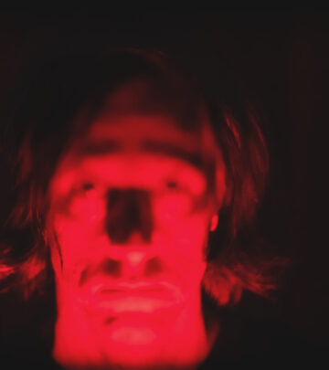 Seasoned bassist explores analog synth atmospheres & industrial beats in darkwave journey.