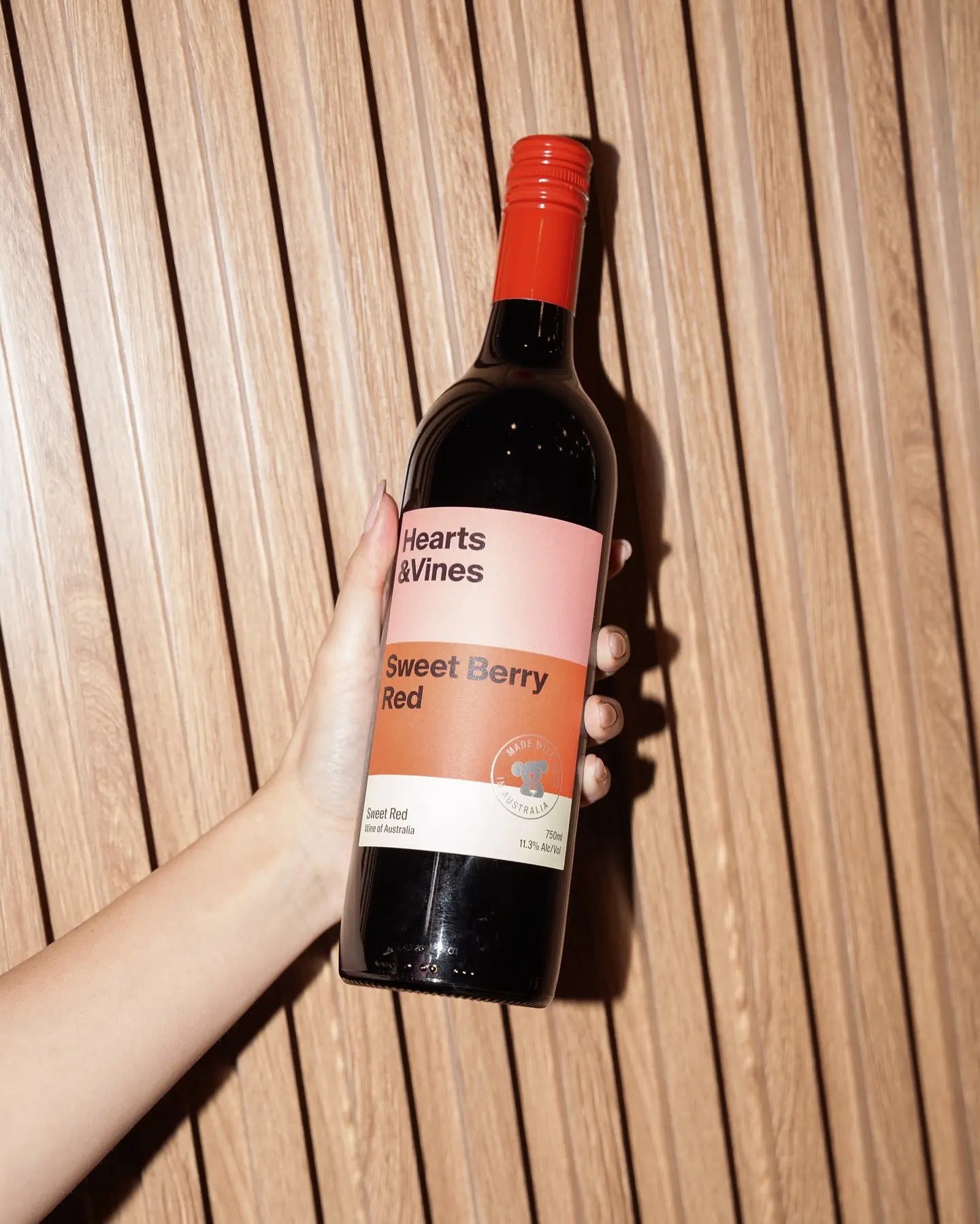 Max Collins Toasts To Australian HeartsAndVines Red Wine