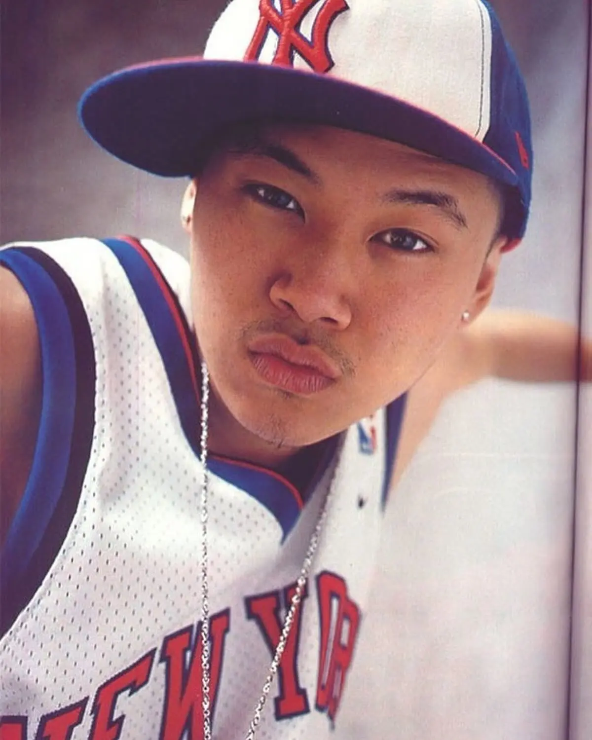 MC Jin’s Early Knicks Fandom in Rare XXL Shoot Relive a 2003–2004 NBA moment captured in a magazine spread showcasing vibrant team pride.