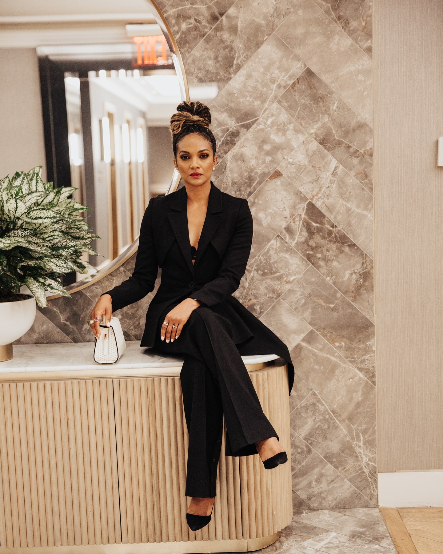 Mekia Cox Shines at Disney Upfronts in New York Star stuns in a sleek suit paired with statement jewels at ABC's vibrant Midtown showcase!