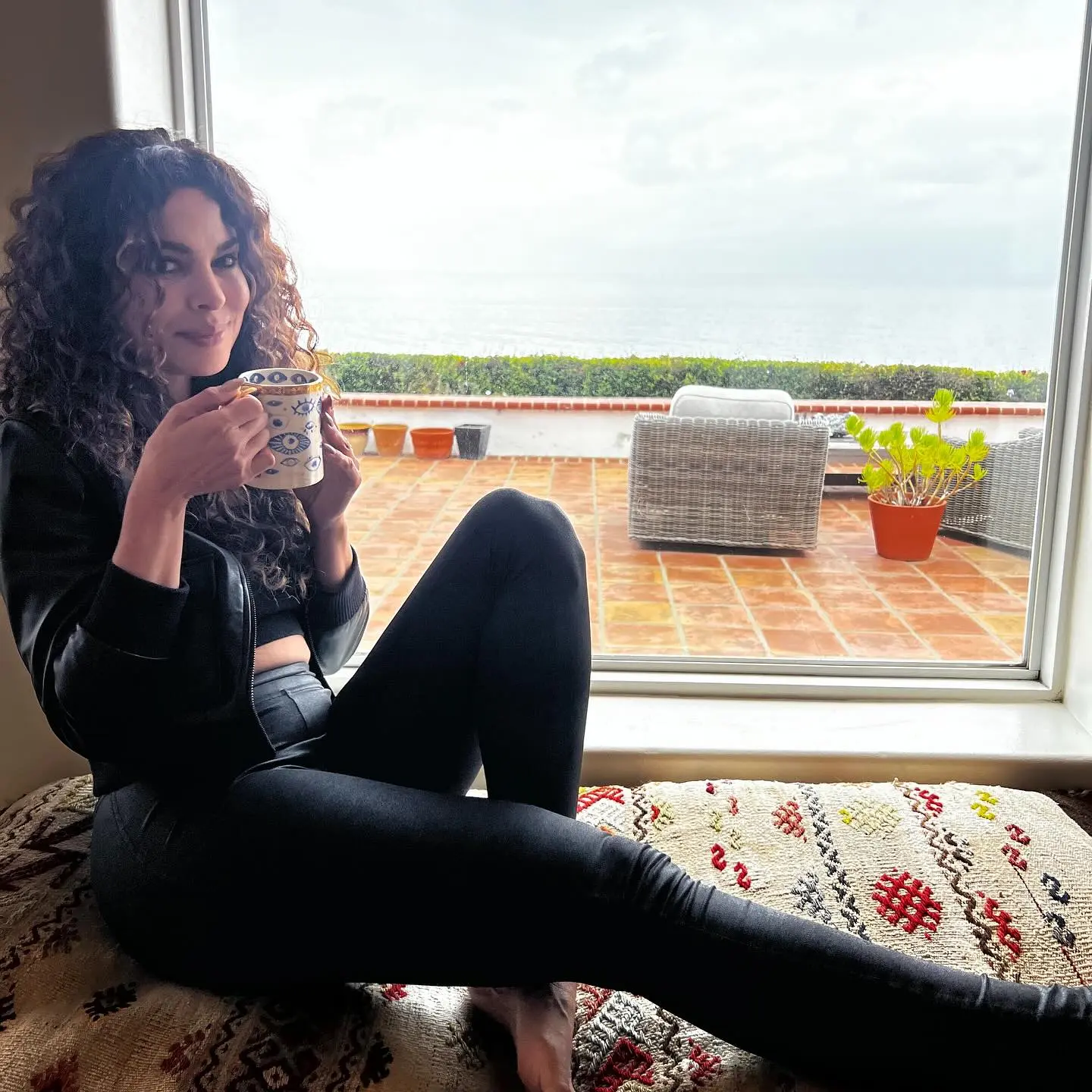Nadine Velazquez Enjoys Coffee By The Ocean Celebrity charm meets ocean breeze and rich coffee moments along sunlit shores - classy!