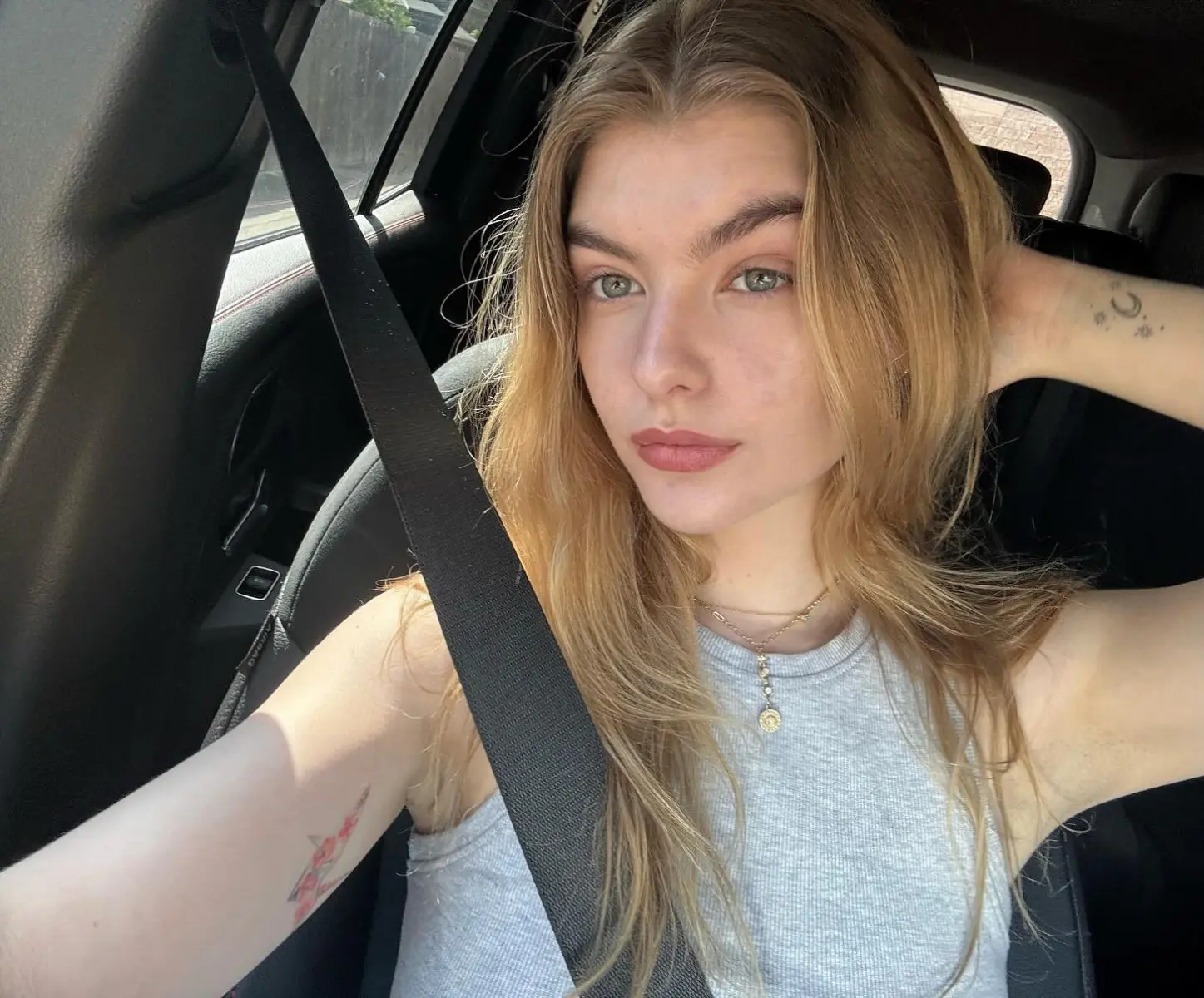 Lyliana Wray flaunts playful charm in her ride, showcasing chic weekend fun vibes in style
