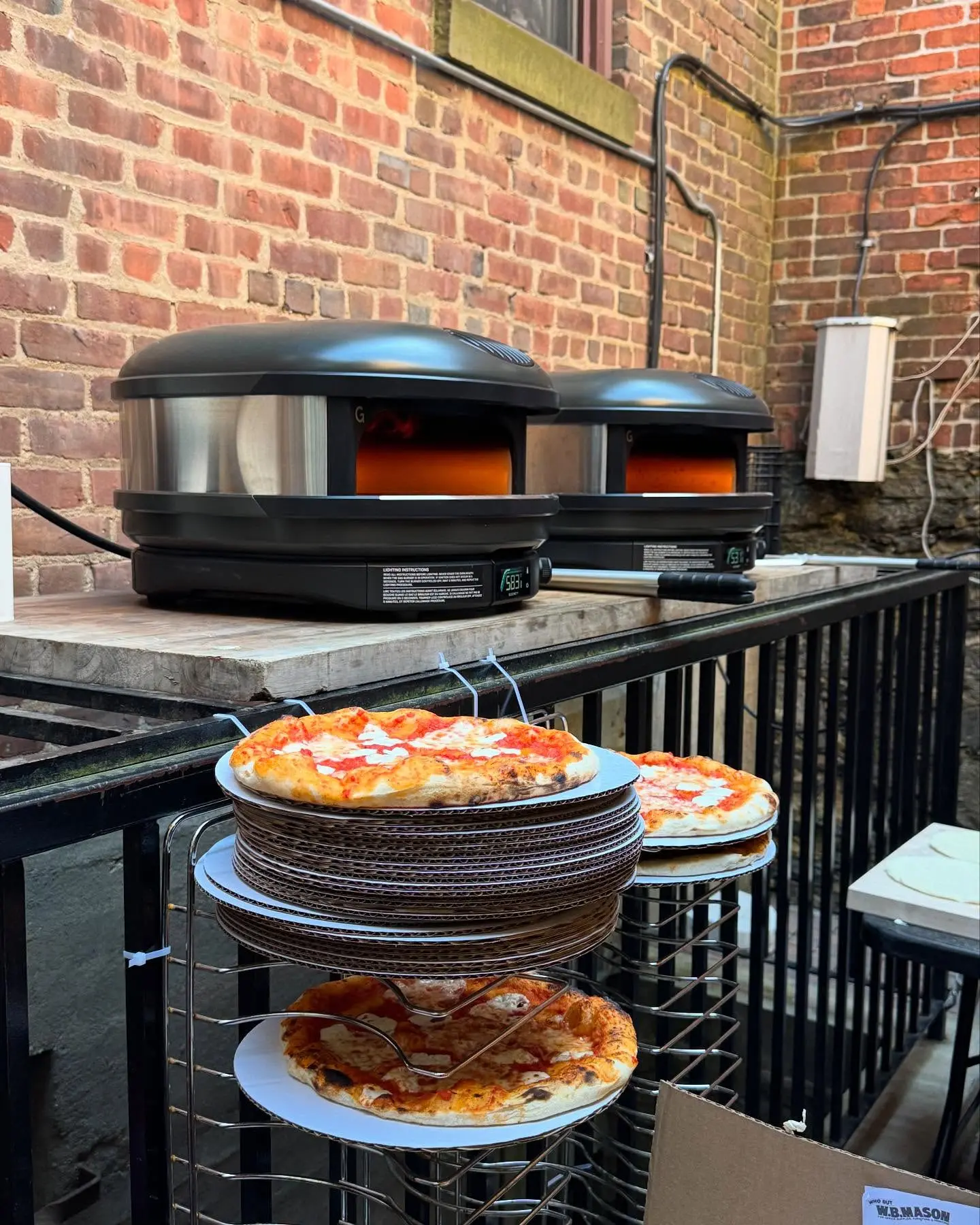 Pizza And Live Tunes At The Capitol Theatre Experience vivid courtyard vibes with pizza and live music under a starlit sky. Join now!!
