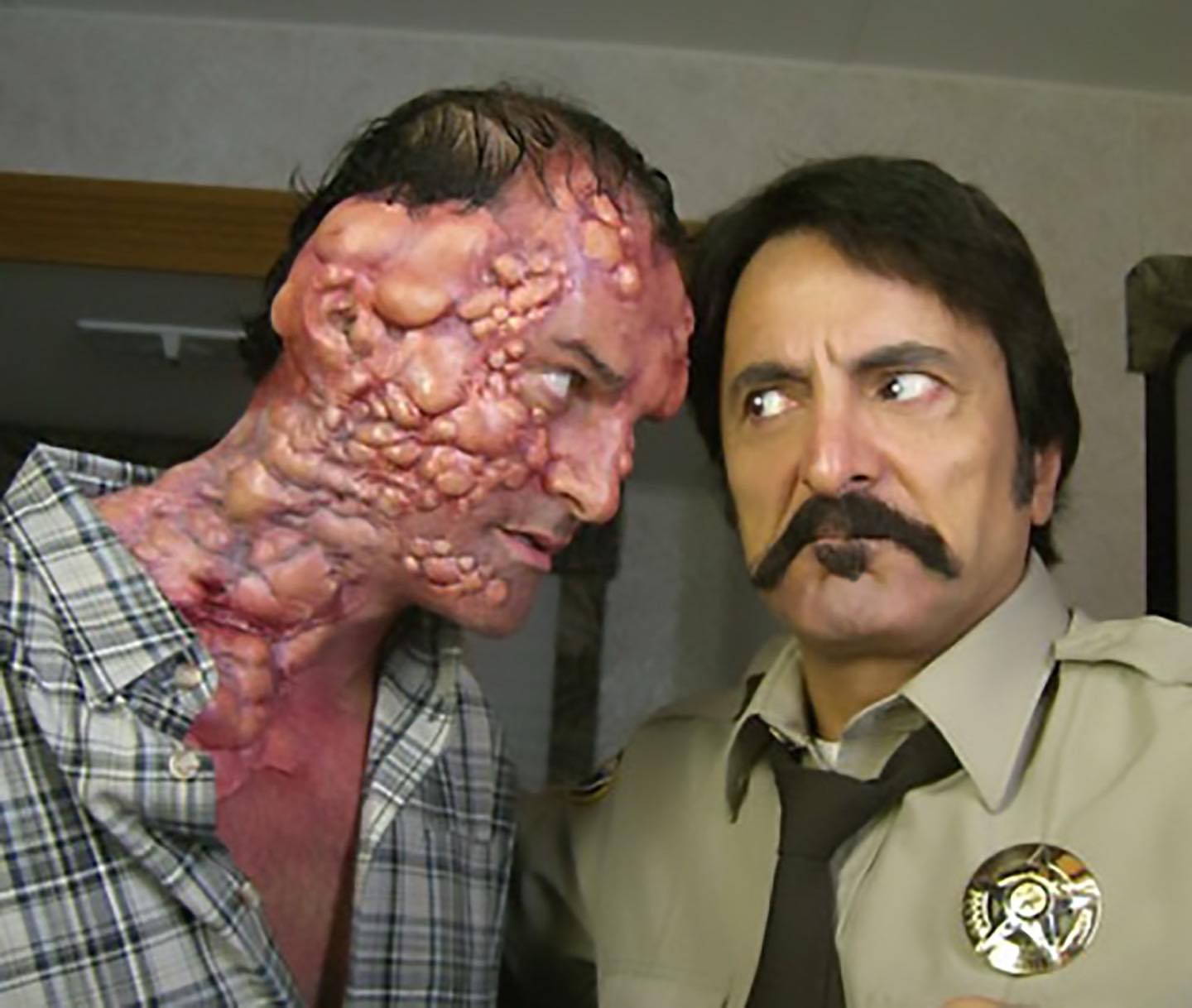 Planet Terror Set Captures Gino Crognale With Tom Savini Gino Crognale graces the Planet Terror set as behind-the-scenes magic meets horror legend.