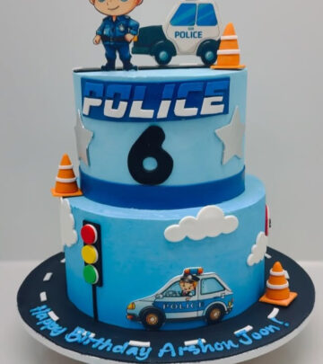 Unique police cake delights birthday party; a charming police car design lights up smiles.