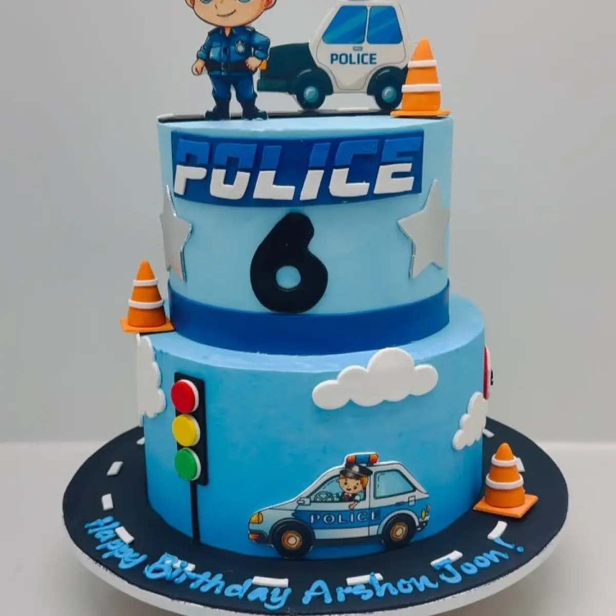 Police Cake Celebrates Child’s Birthday Unique police cake delights birthday party; a charming police car design lights up smiles.