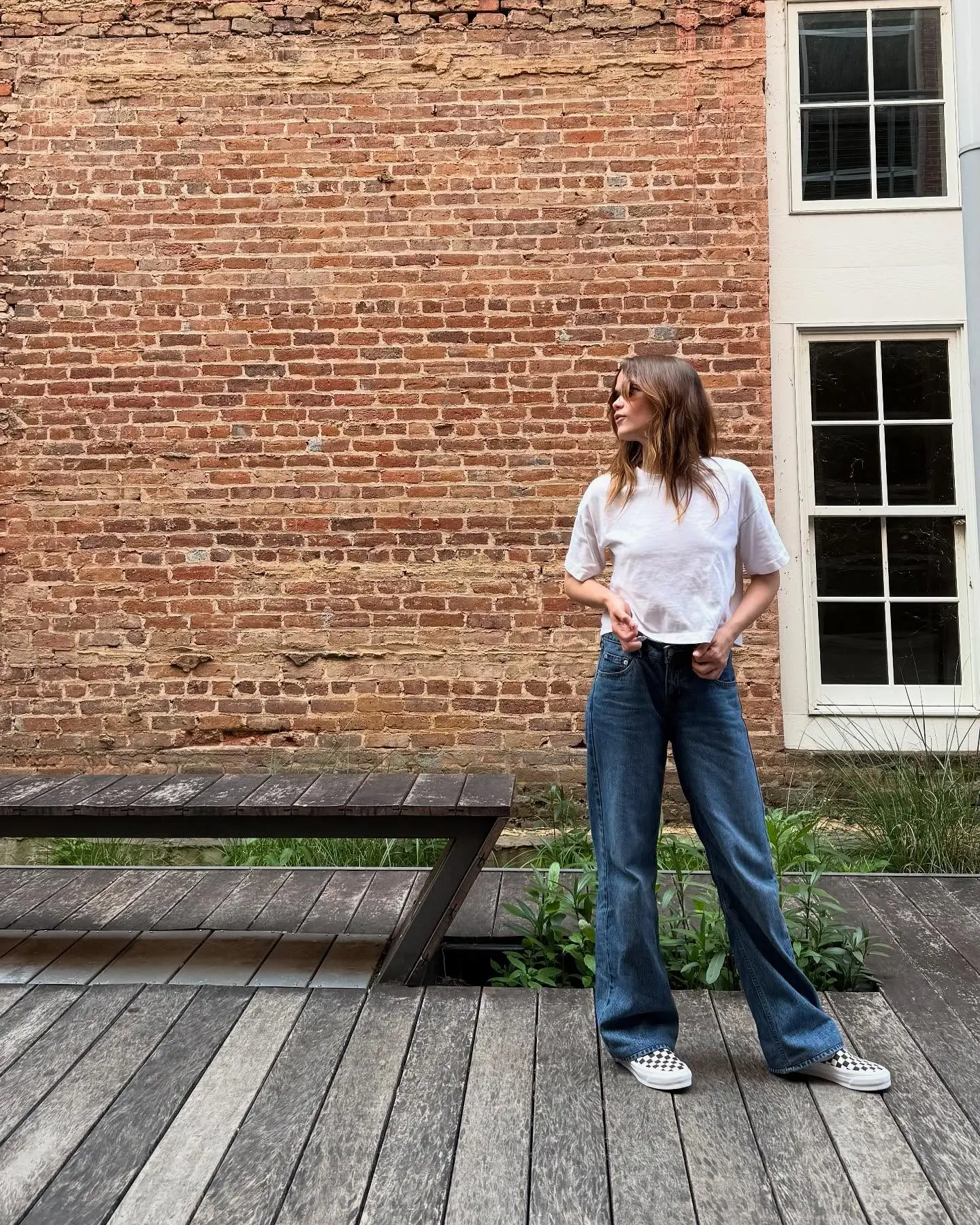 Rising star shifts gears with chic Vans style, blending youthful energy and timeless flair.