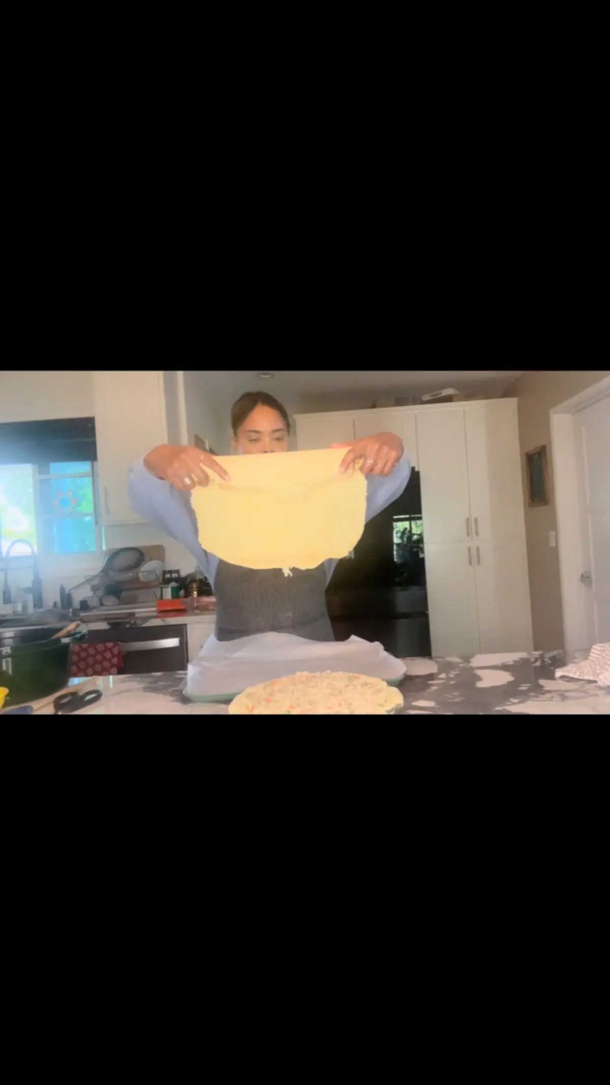 Actress Sharon Leal charms fans with a quirky nod to 80s flair and a vintage pot pie treat.
