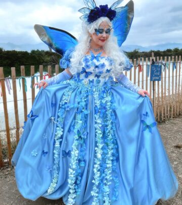 Stanzi charms in fairy costume at a renaissance fair celebrating magic tokens with grace!
