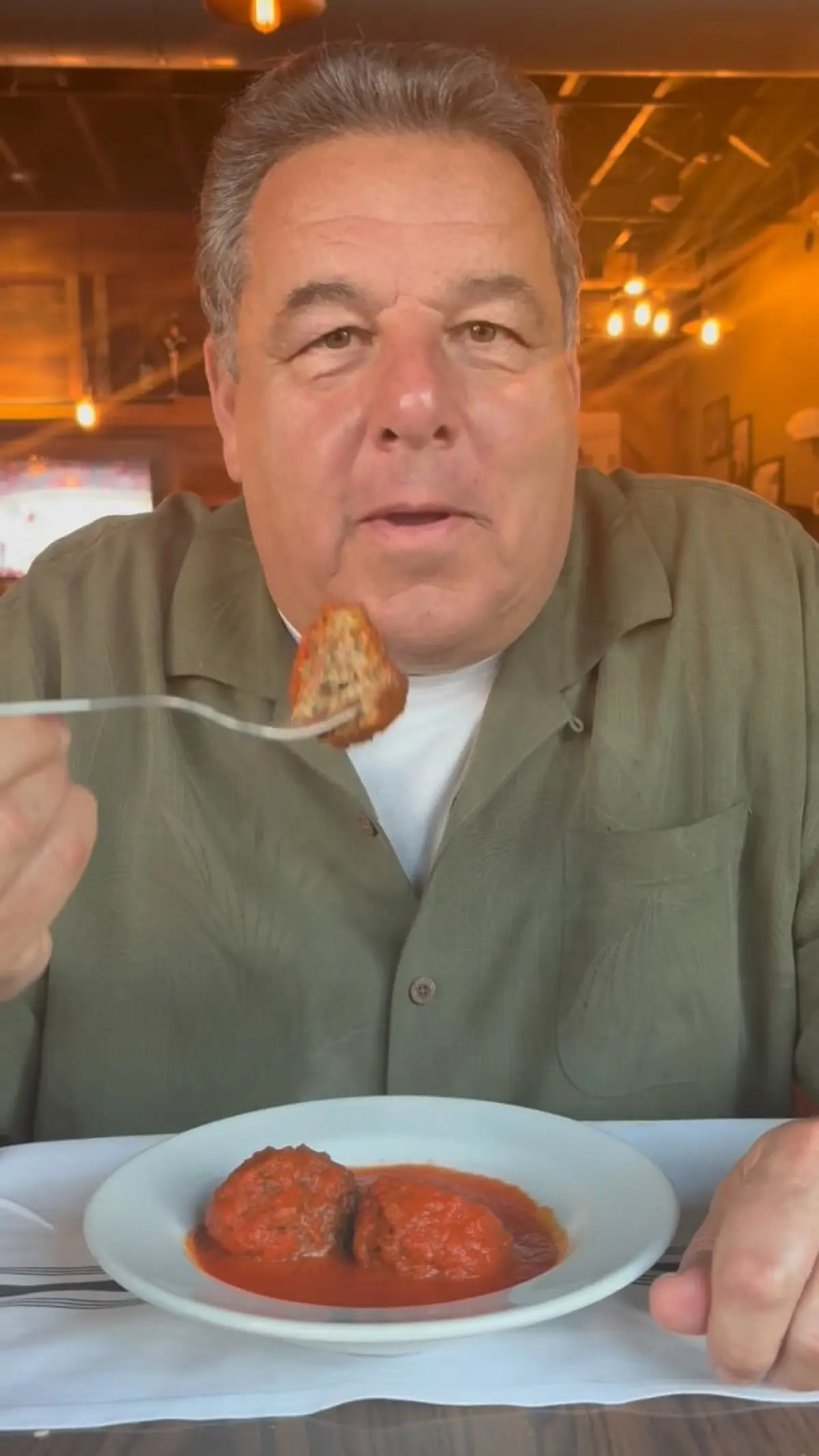 Veteran actor indulges in Longos meatballs and local flavors during a vibrant event in RI.