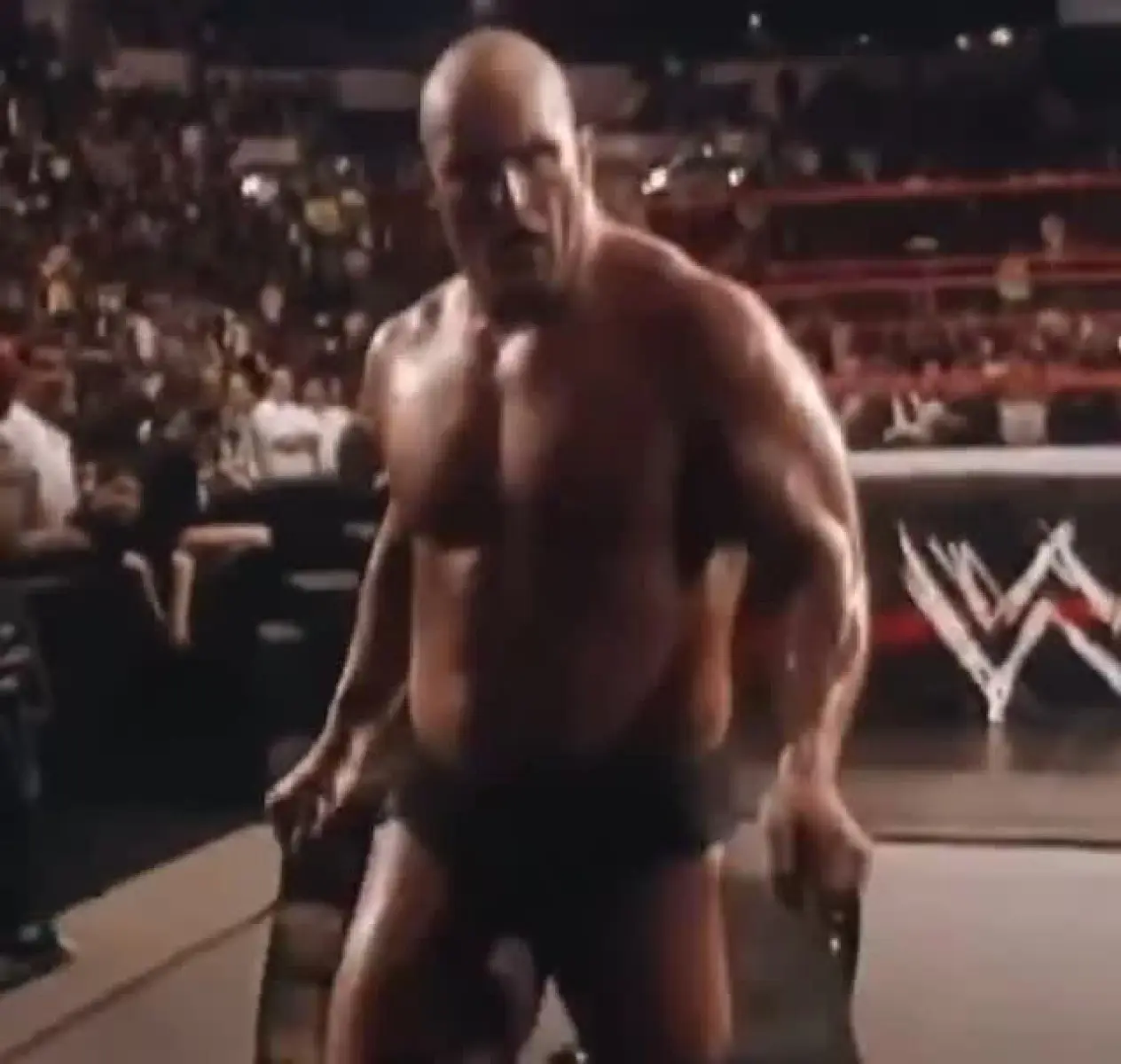 Wrestling legend Stone Cold Steve Austin gets a heartfelt hug following a guard rail jump!