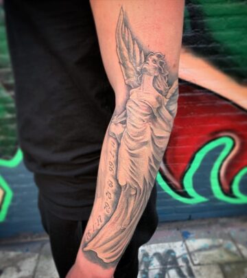A Bold Arm Gallery Merging Black Roses, Angel Wings & Silent Mastery of Ink in Fine Detail