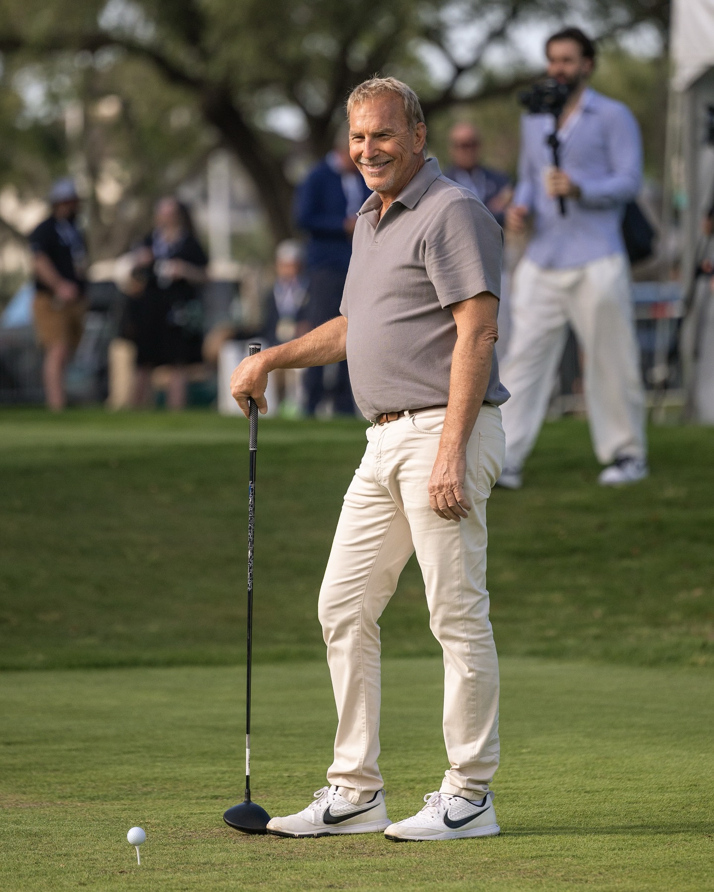 Costner relishes a coastal ride, soaking in vibrant ocean views and timeless charm indeed.