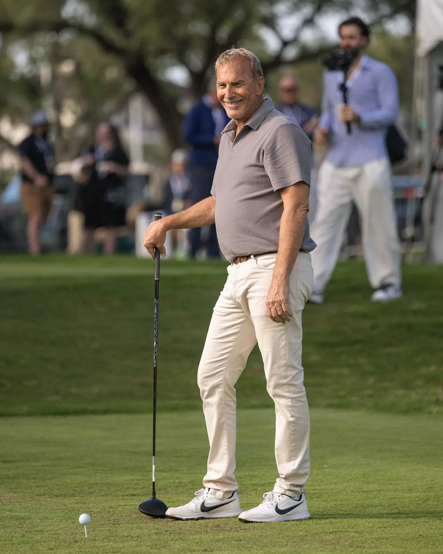 Costner relishes a coastal ride, soaking in vibrant ocean views and timeless charm indeed.