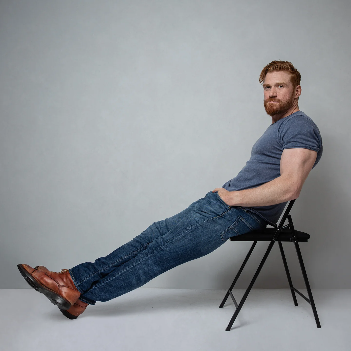 Take A Seat: Midweek Portrait Unveiled Stylish midweek seating portrait capturing a relaxed vibe through creative photography -X!