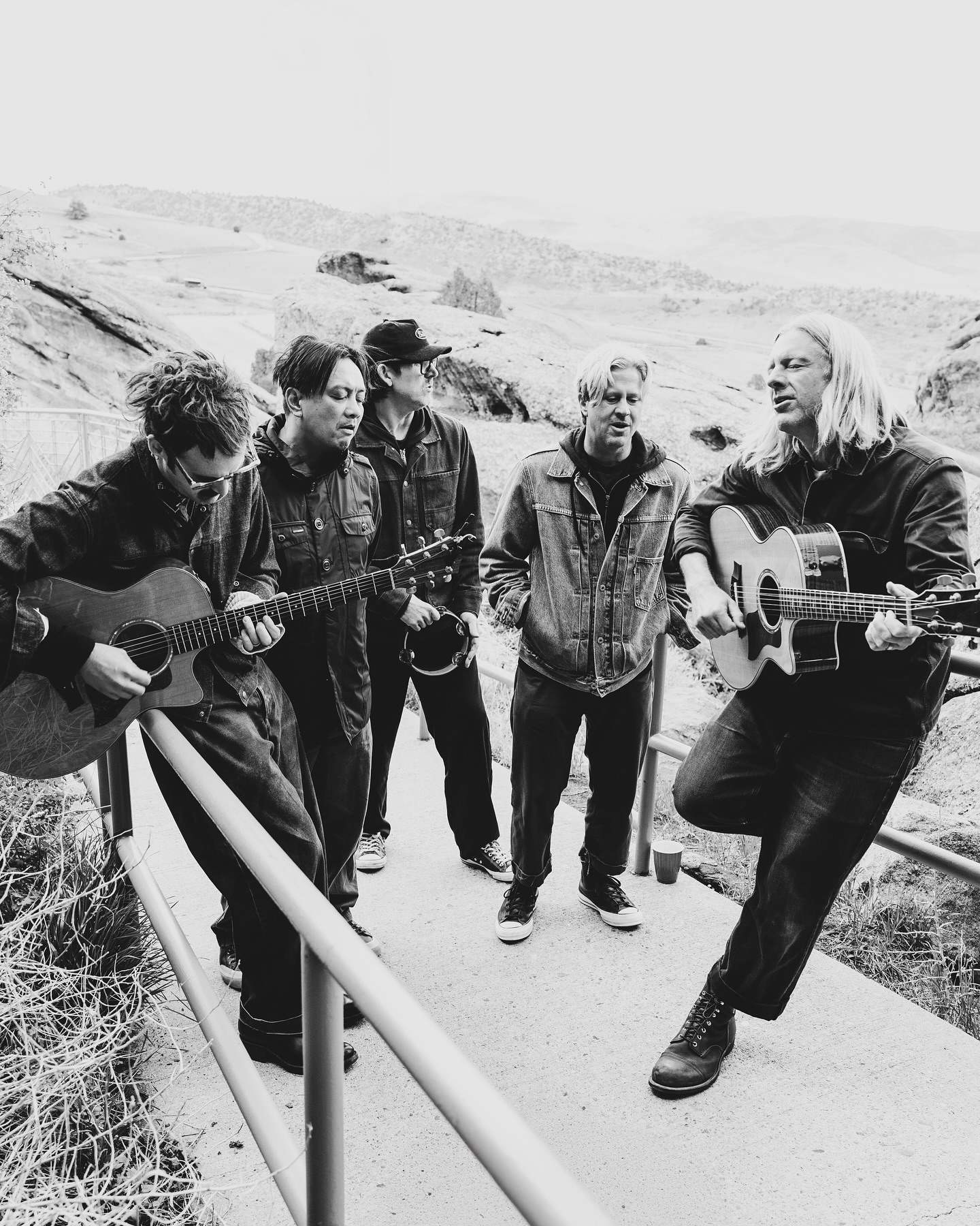 Tim Foreman celebrates a vibrant bond at red rocks, uniting community with nature all day!