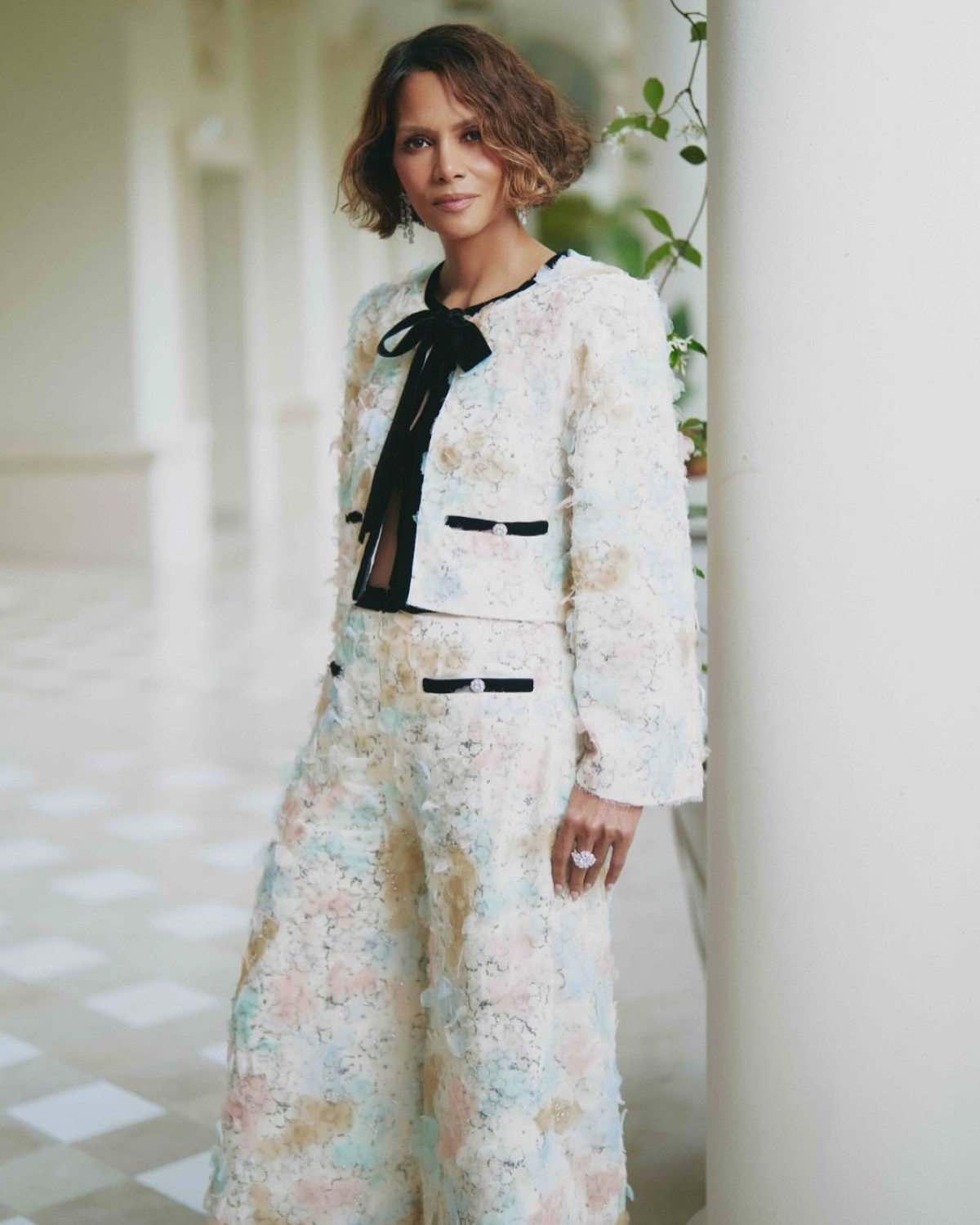 Timeless With A Twist Halle Berry stuns in a chic Chanel ensemble, blending classic glamour with modern flair!!