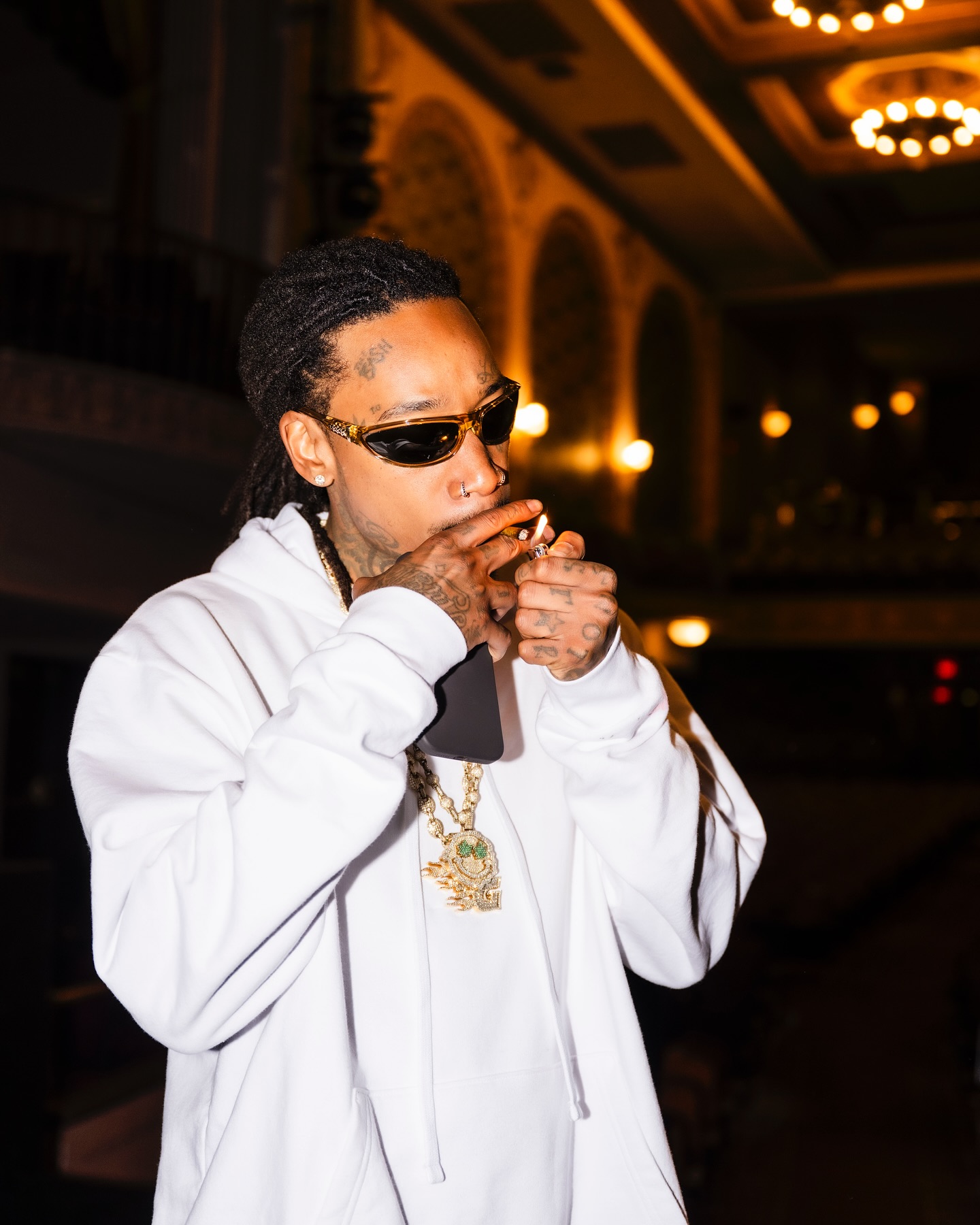 Wiz Khalifa Preps Tour And Merch While Engaging Fans