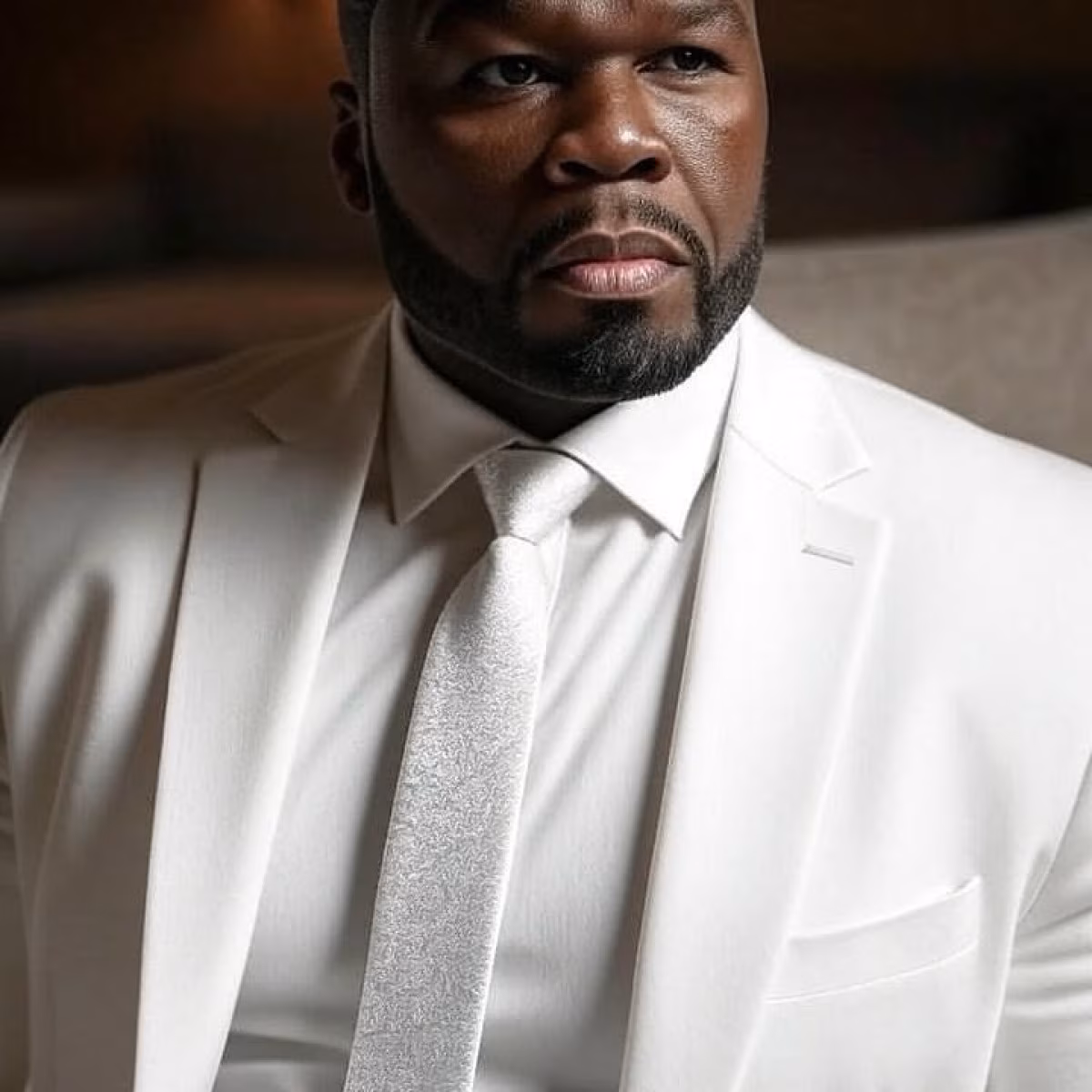 50 Cent Mocks Kanye’s Grammys Look in All-White Instagram Post 50 Cent rocks white photos & teases Kanye over his Grammys outfit in snarky Instagram jab!