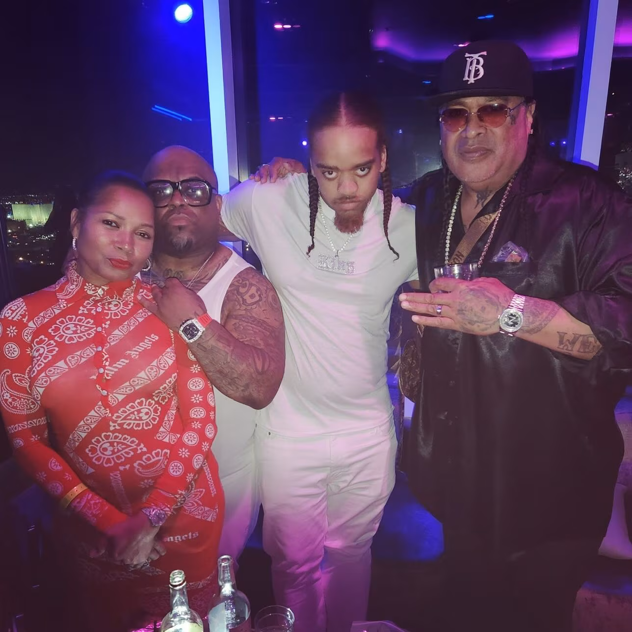 CeeLo Green Shares Family Moment at Poinsettia Garden Singer teases fans with a sweet portrait alongside loved ones amid colorful holiday blooms