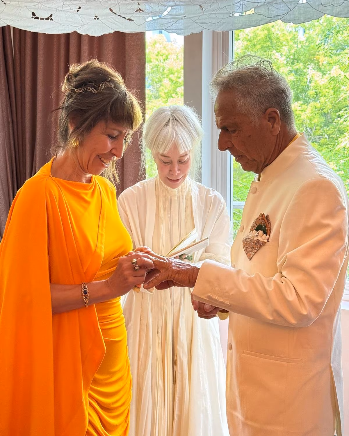 Actress offers warm congratulations to her longtime photographer friend on marriage bliss!