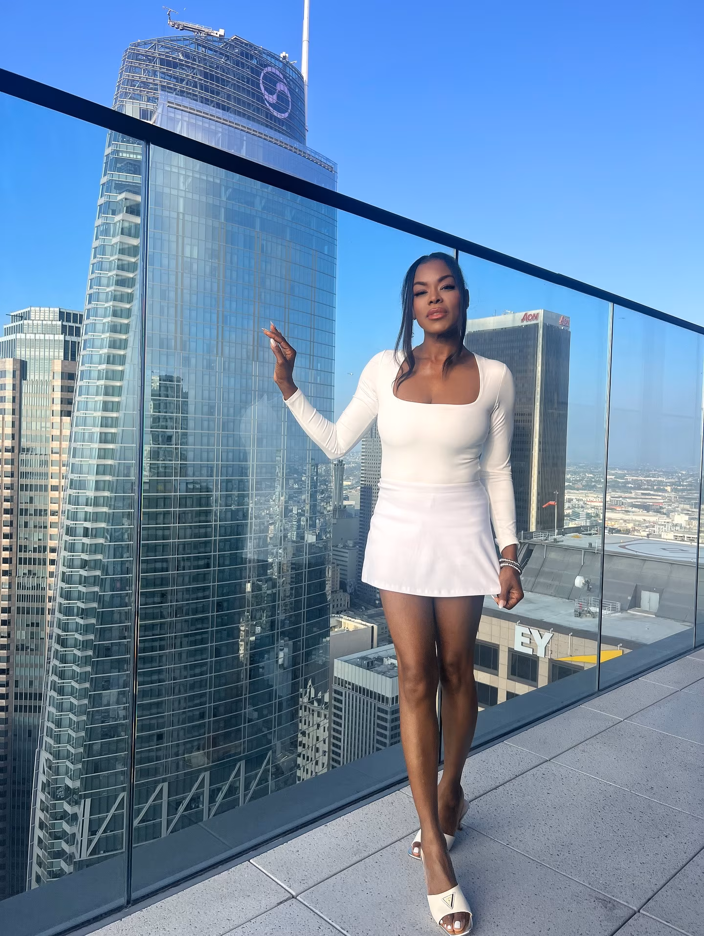 Golden Brooks Stuns in All-White Summer Look with Daughter Golden Brooks beams in breezy white ensemble as she relaxes poolside with her little one!!