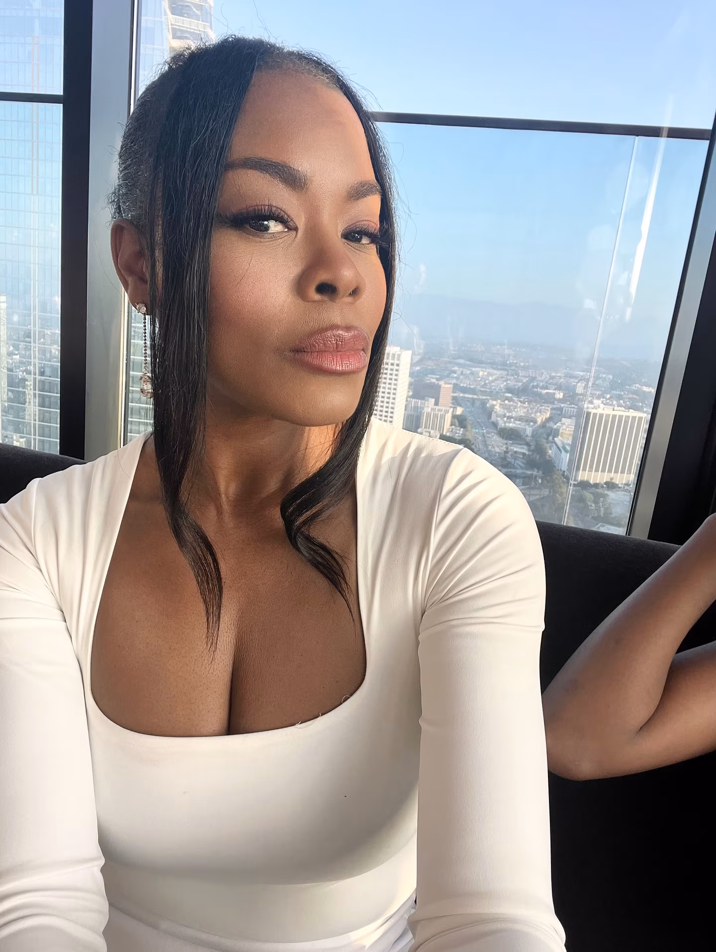 Golden Brooks Stuns in All-White Summer Look with Daughter