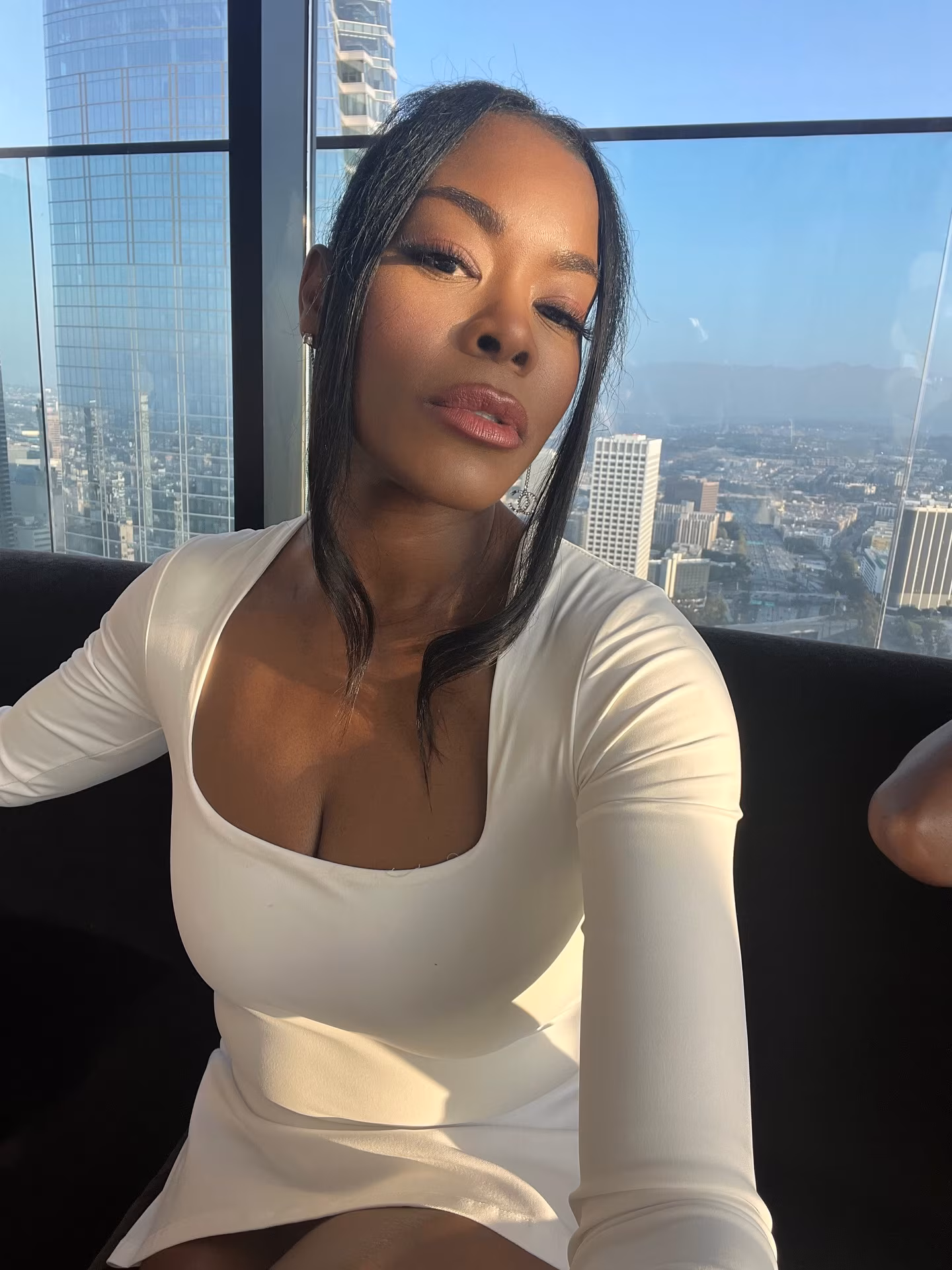 Golden Brooks Stuns in All-White Summer Look with Daughter