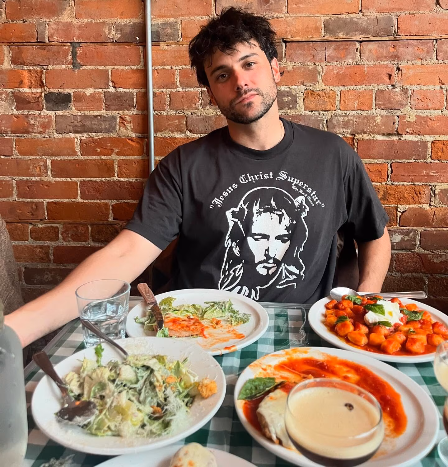 The HTGAWM star savors Italian pasta turning a cozy meal into small moment of mindful joy.