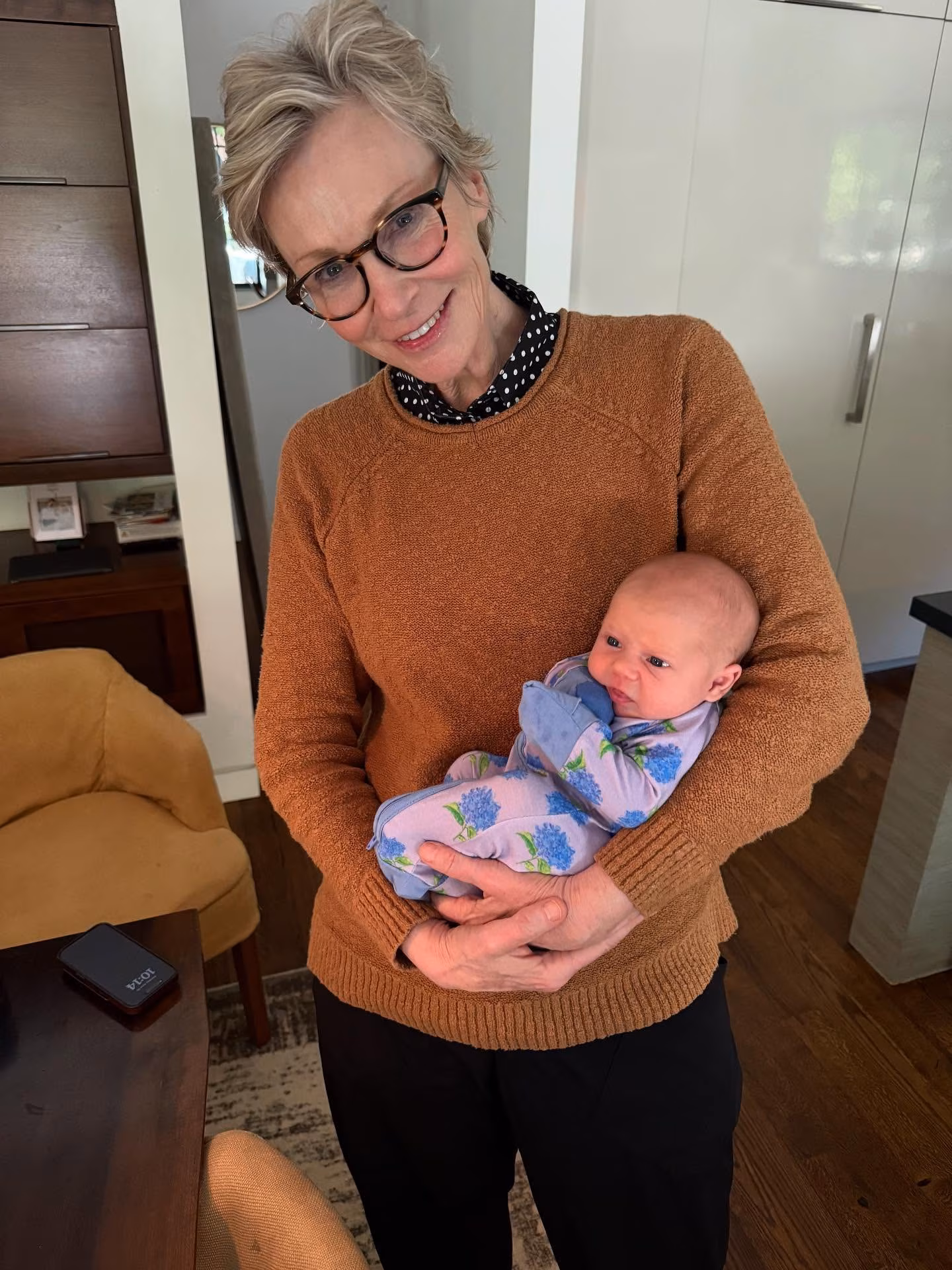 Emmy winner Jane Lynch shares a delightful family snapshot celebrating a tiny bundle of joy.