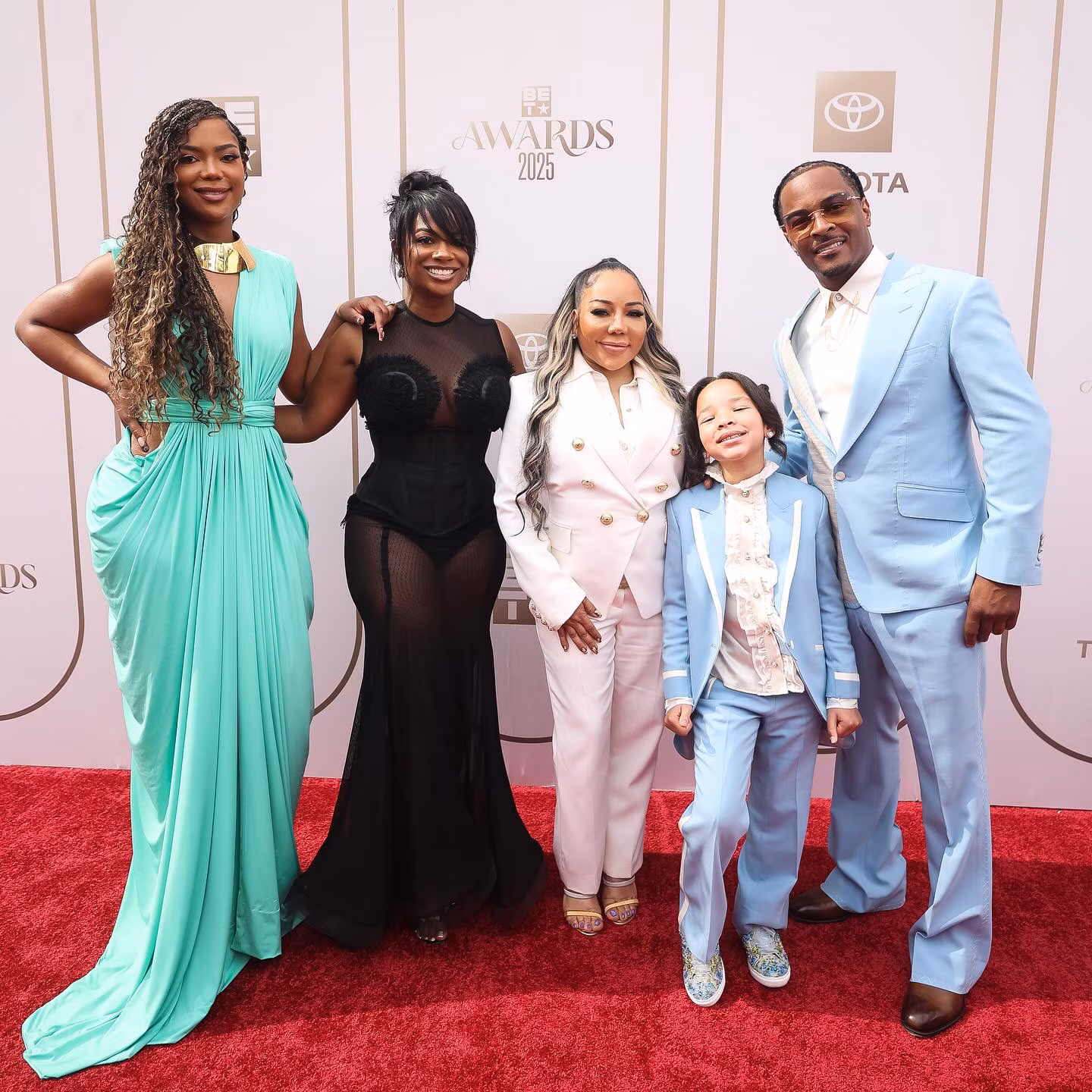Kandi Burruss Shines Celebrating Black Excellence at BET Awards GRAMMY winner flaunts bold red carpet looks and captures stunning moments of style and joy